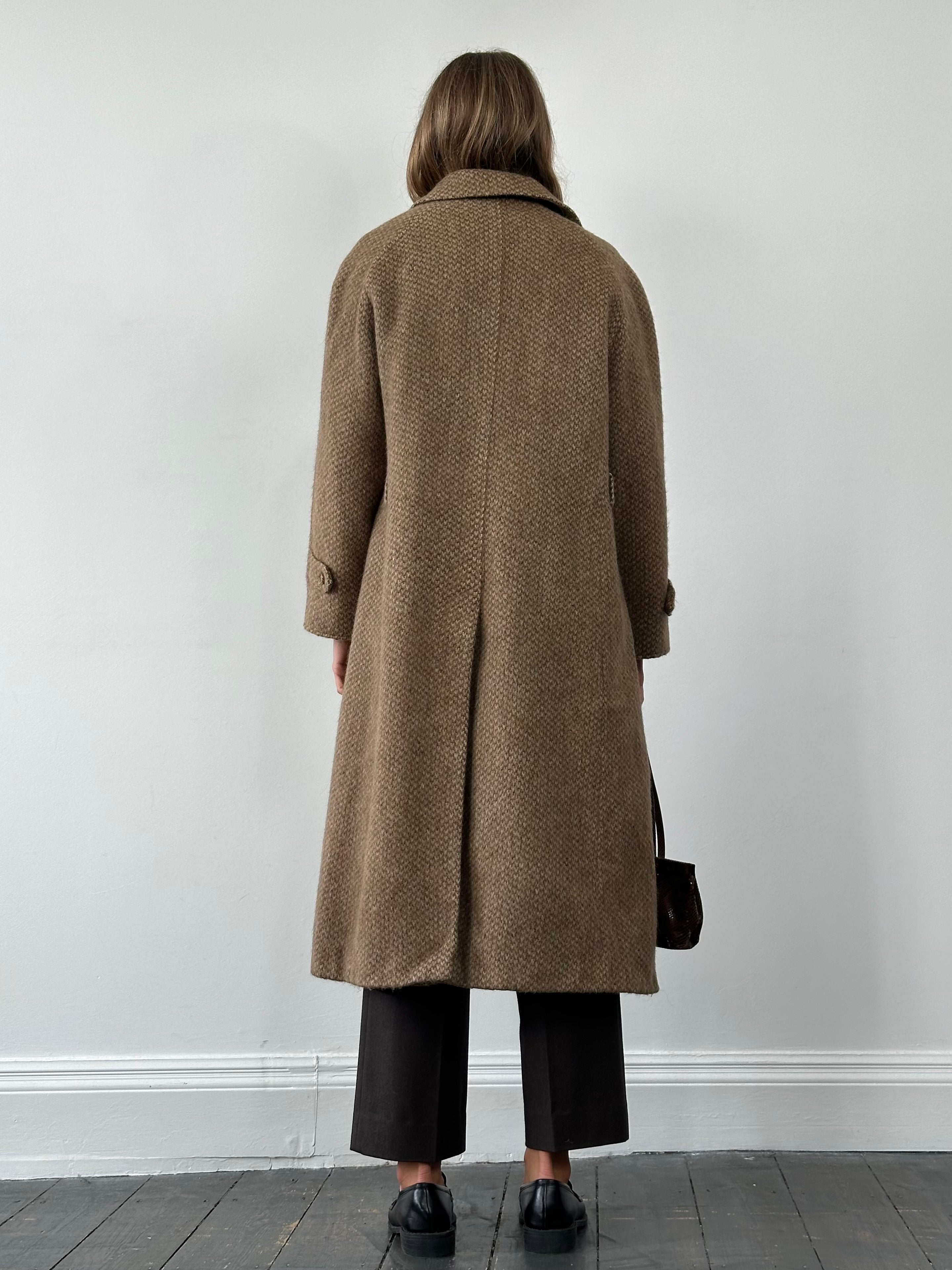 Max Mara pure wool fuzzy coat with concealed placket, long sleeves, and a classic collar in a cozy, textured design.