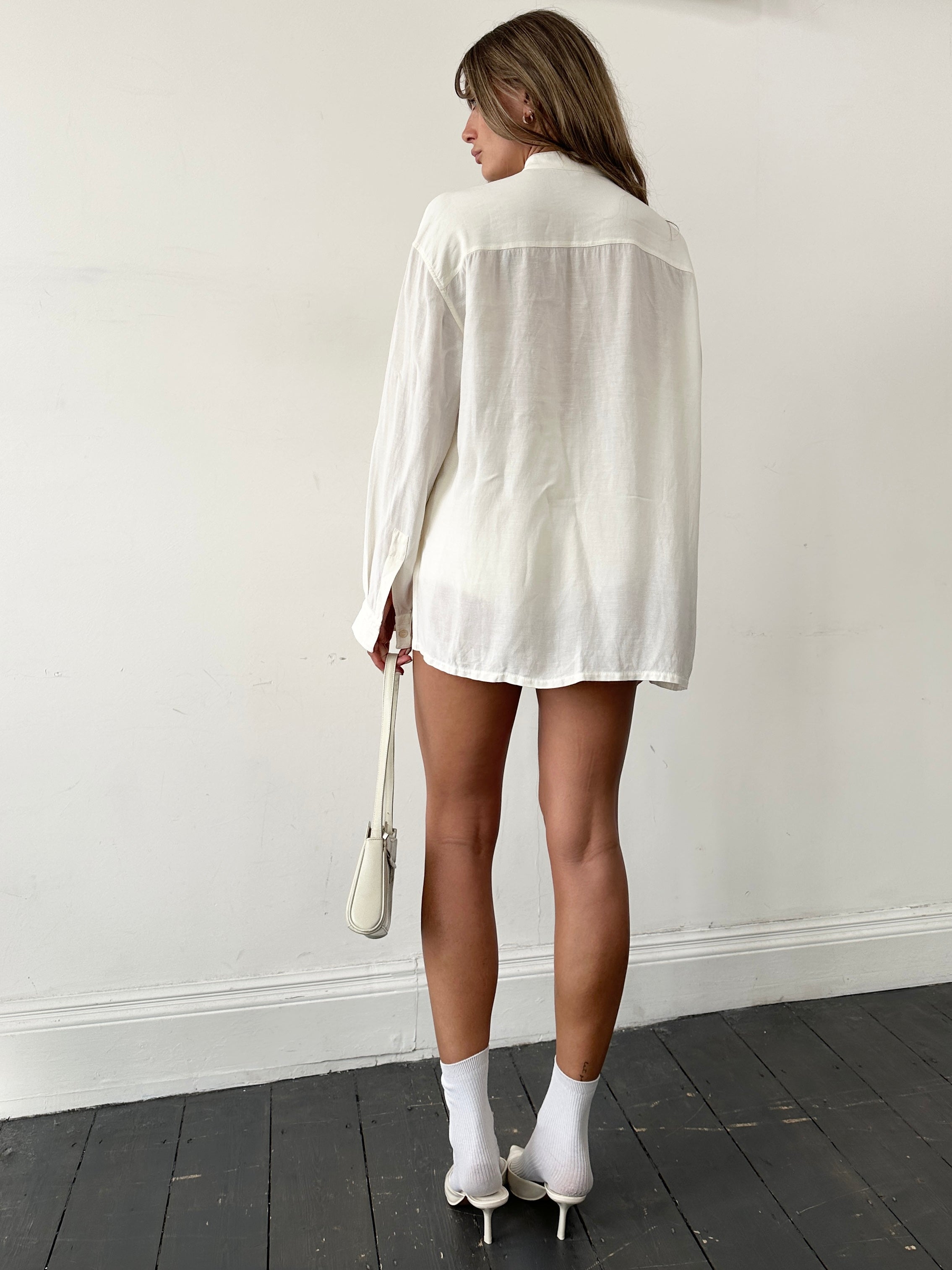 Byblos Italian linen sheer slide split shirt in XL, lightweight and airy with a relaxed fit, shown in natural fabric detail.