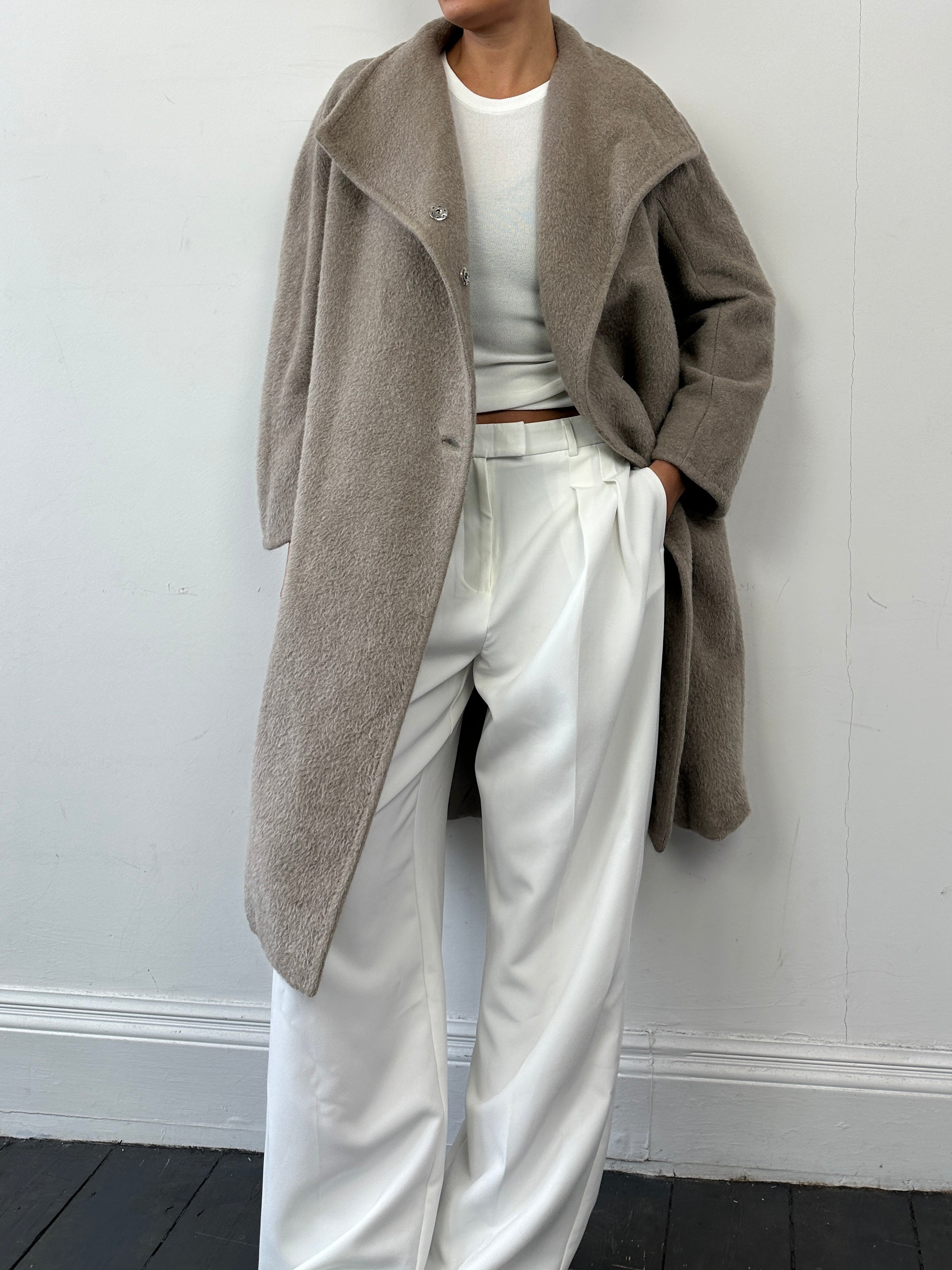 Max Mara alpaca wool belted wrap coat in neutral color, showcasing its elegant design and tailored fit.
