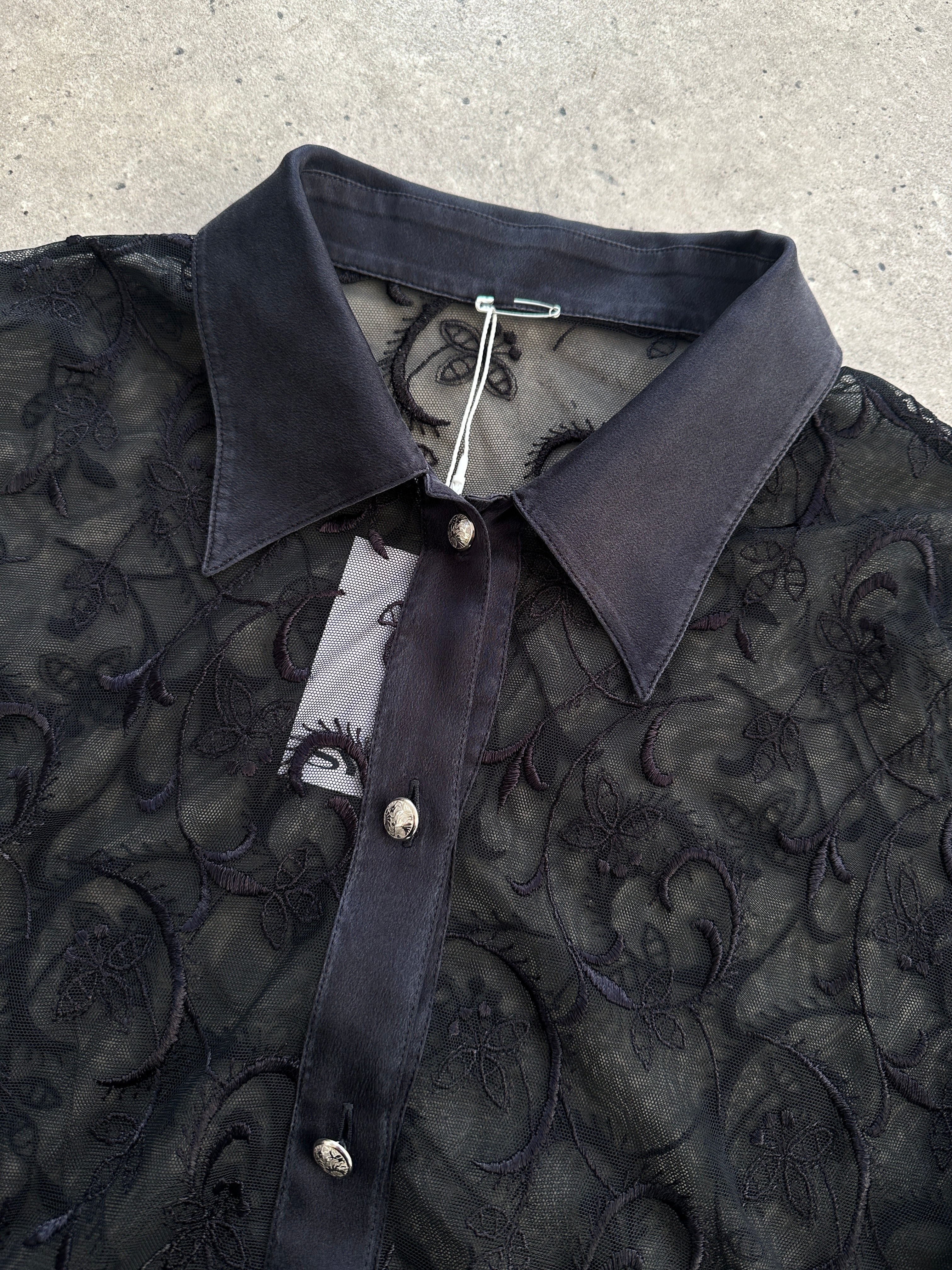 Vintage lace sheer silk trim shirt in size large, featuring delicate lace details and elegant silk fabric.