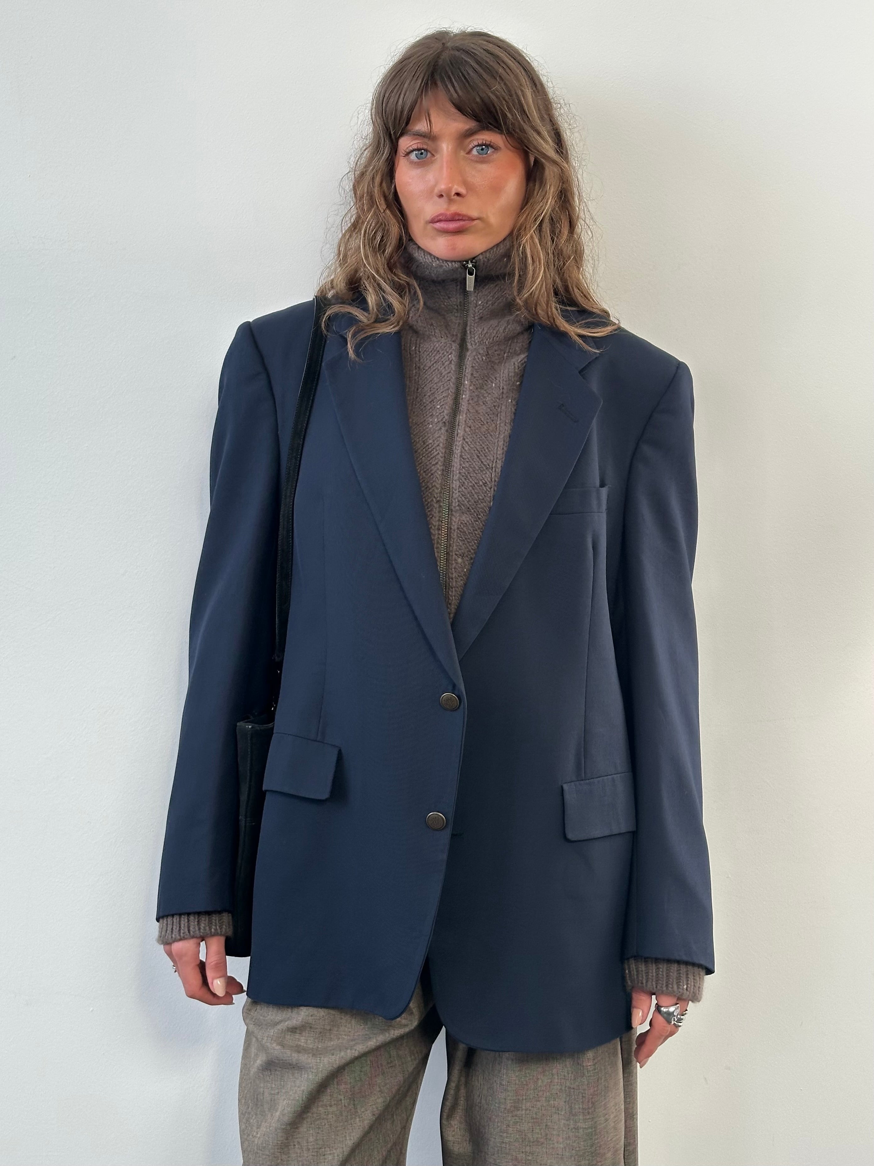 Christian Dior Monsieur 1990s pure wool single-breasted blazer in size 44R/XL, shown on a hanger with front view and classic lapel detail.