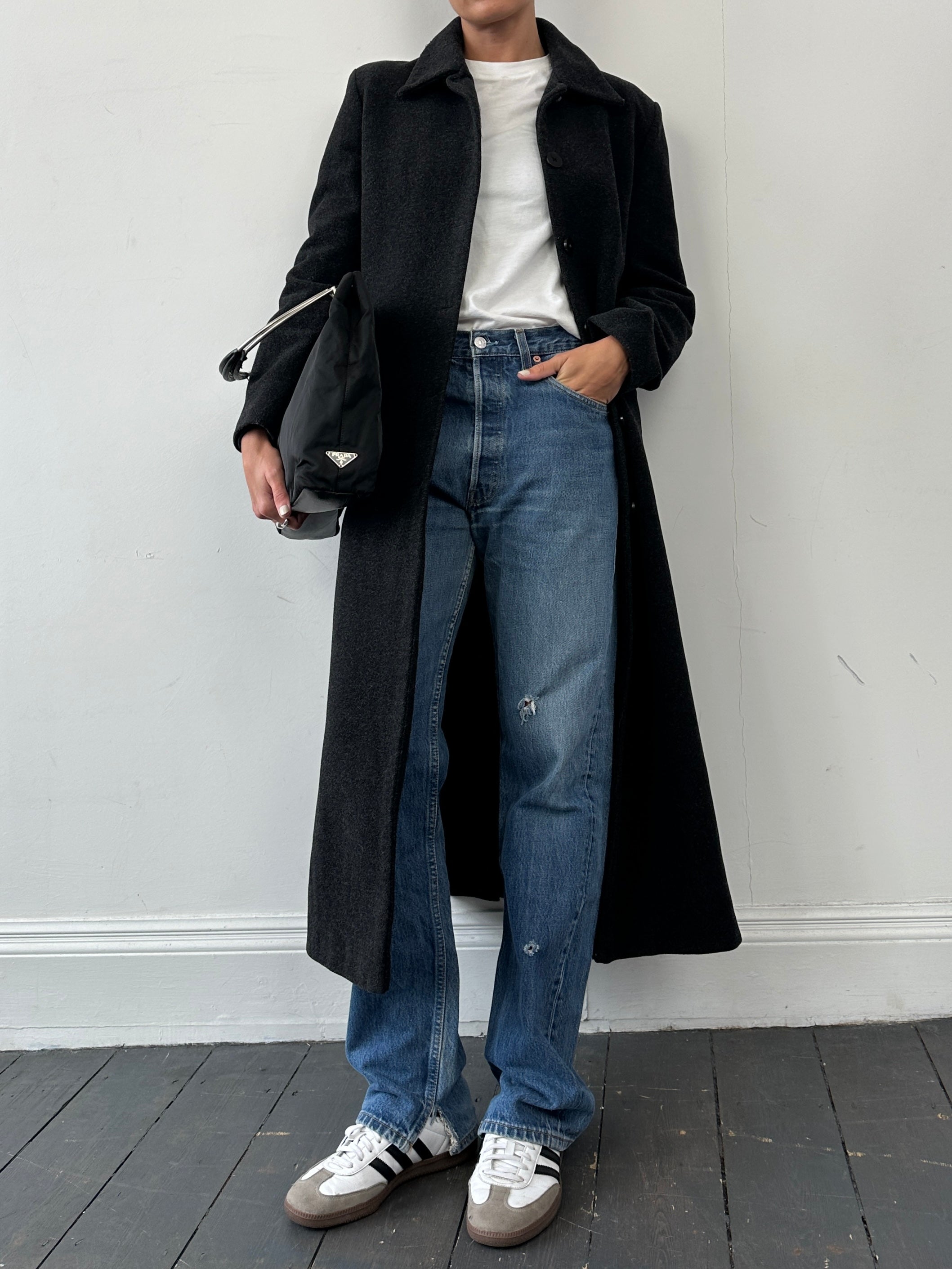 Levi’s 501 mid wash distressed straight leg denim jeans, W30, showing front view with classic five-pocket design and frayed details.