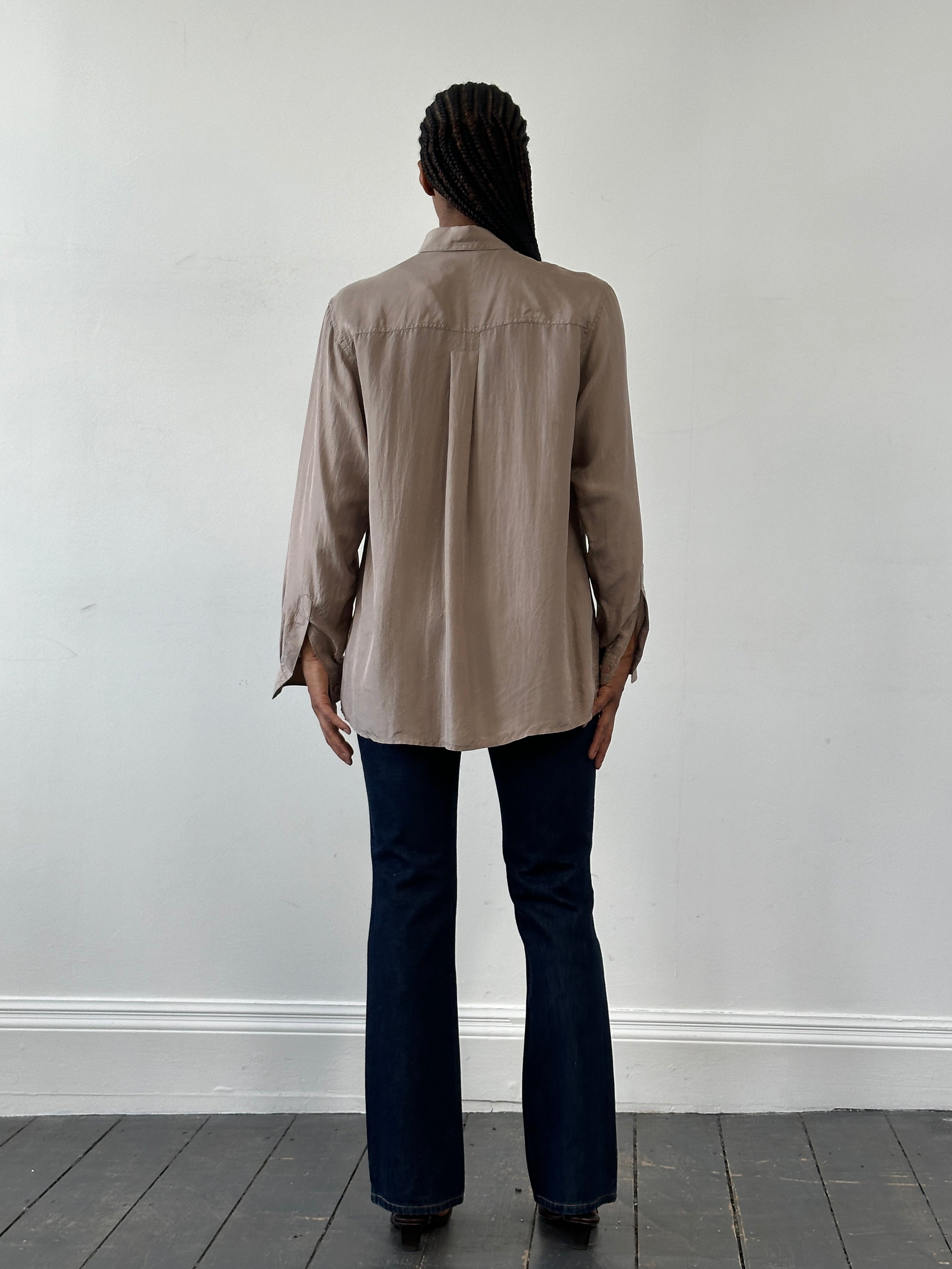 Vintage 1990s pure silk shirt, M/L size, with classic design and smooth fabric, shown on a hanger.