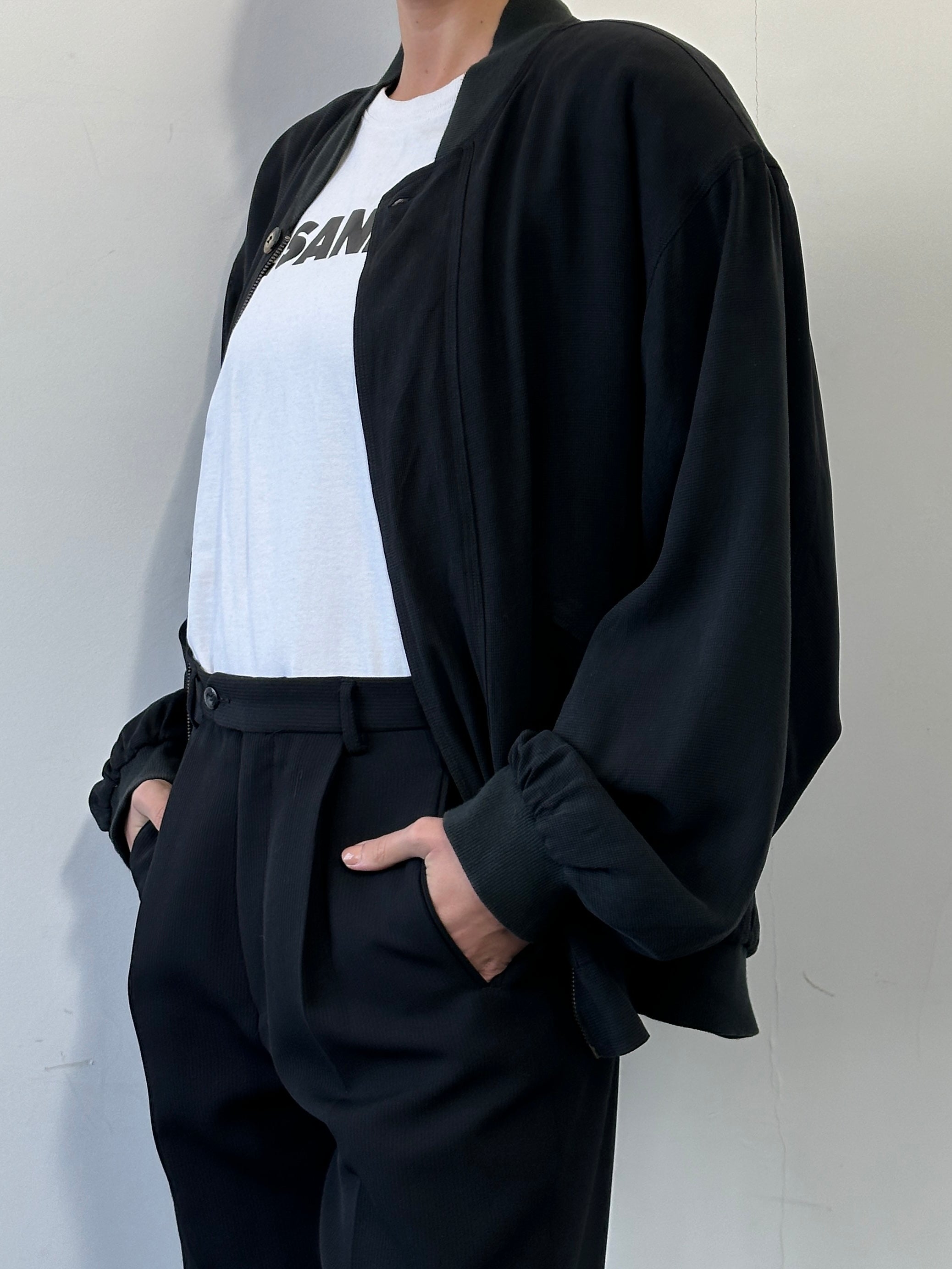 Vintage Italian vintage pure silk bomber jacket, size large, featuring a sleek, classic design with shiny silk fabric.