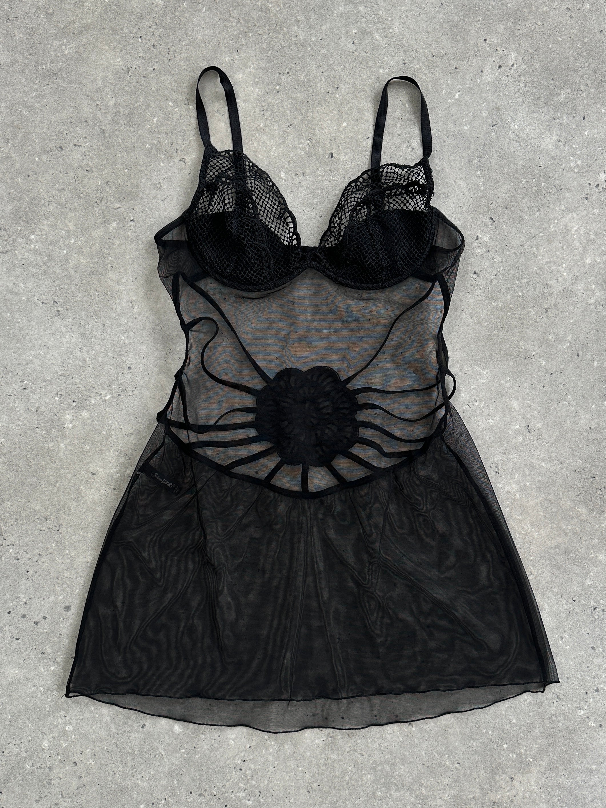 Vintage Italian vintage sheer babydoll lingerie top in size S, featuring delicate fabric and elegant design.