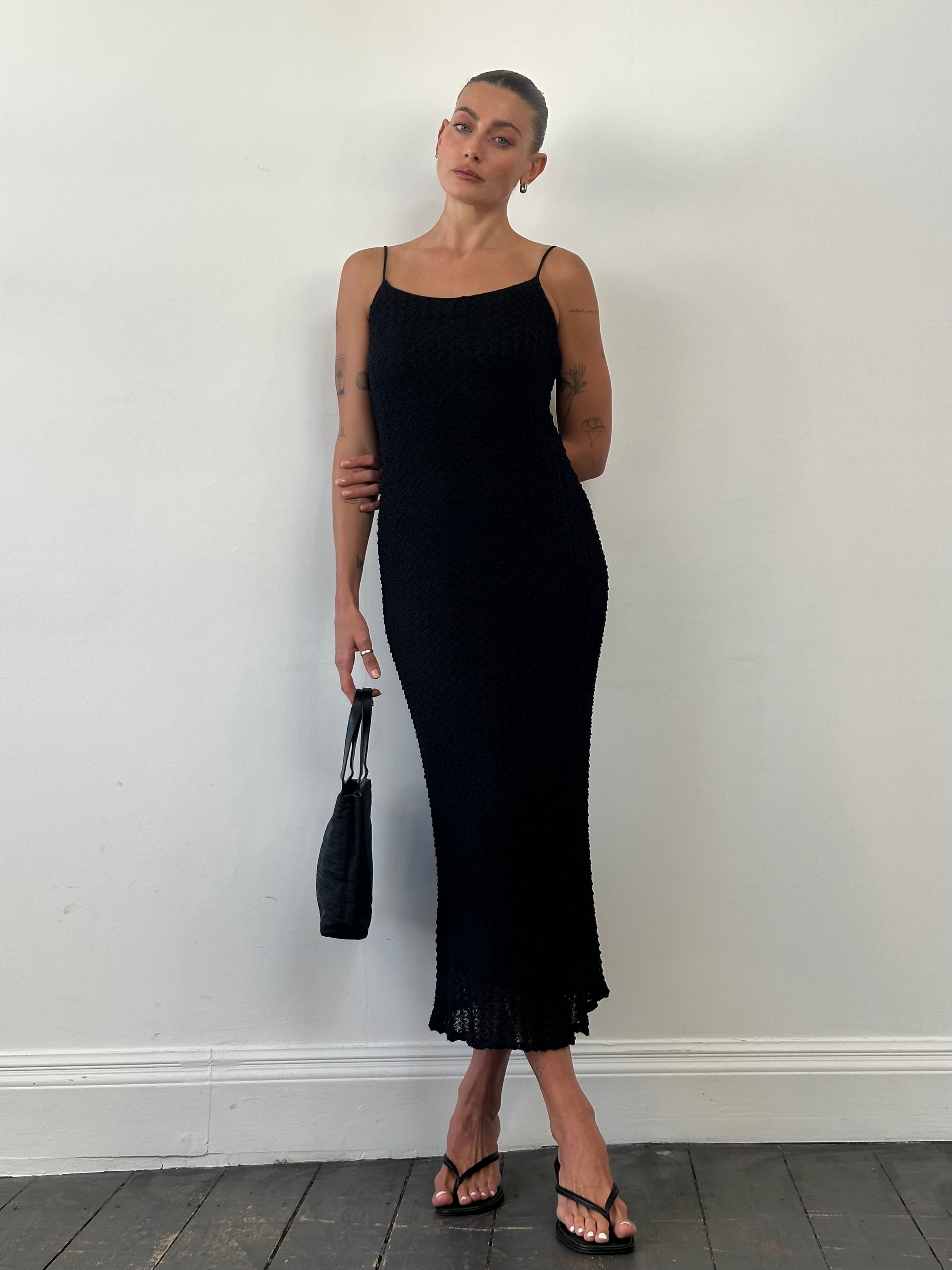 American Vintage textured maxi dress in size small, flowing fabric with a relaxed fit and elegant design.