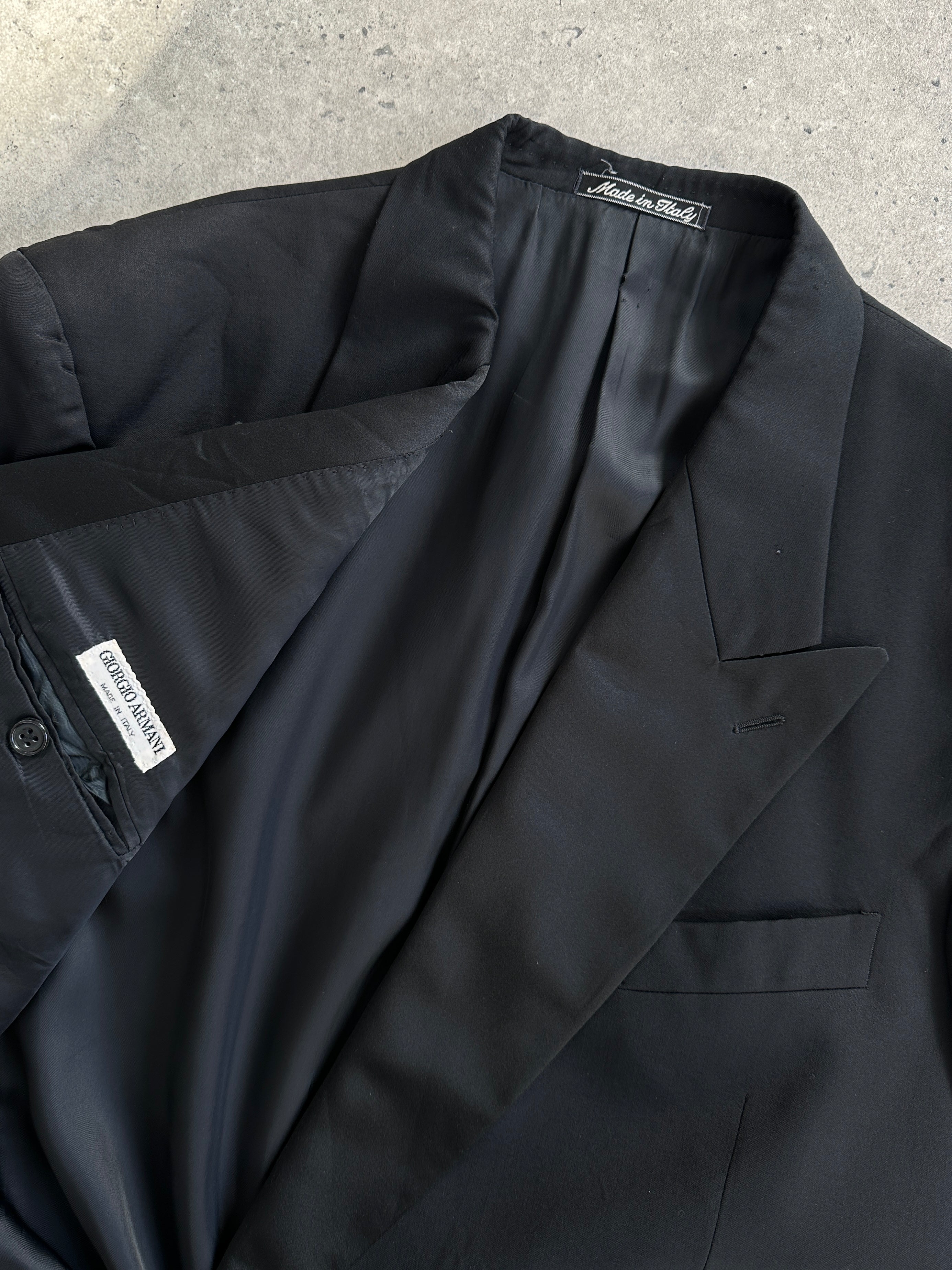 Giorgio Armani double-breasted blazer in size L/XL, tailored formal tuxedo blazer with sleek black fabric and classic fit.