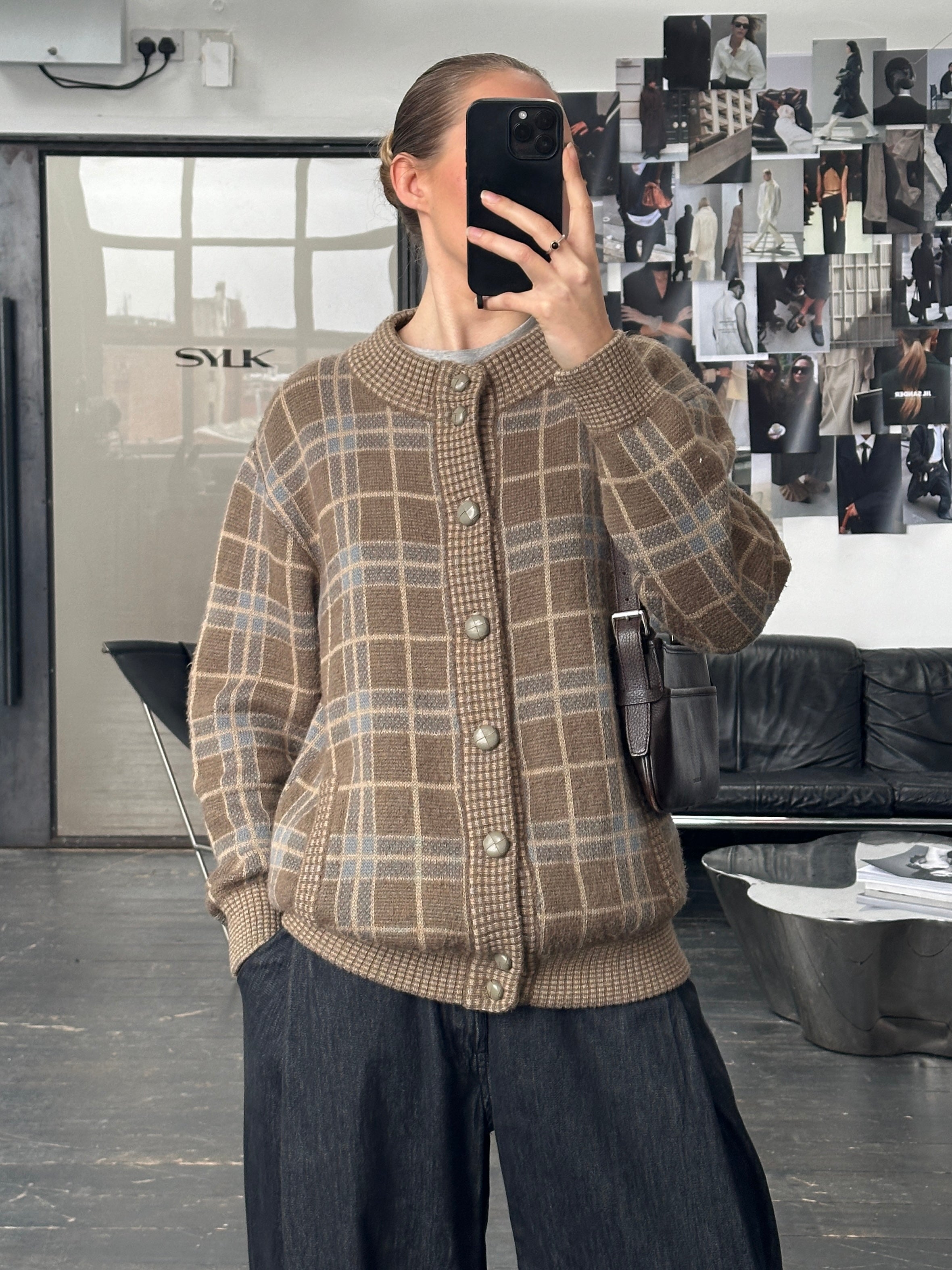 Vintage Italian 1990s wool check cardigan in XL, featuring classic plaid pattern and cozy knit texture.