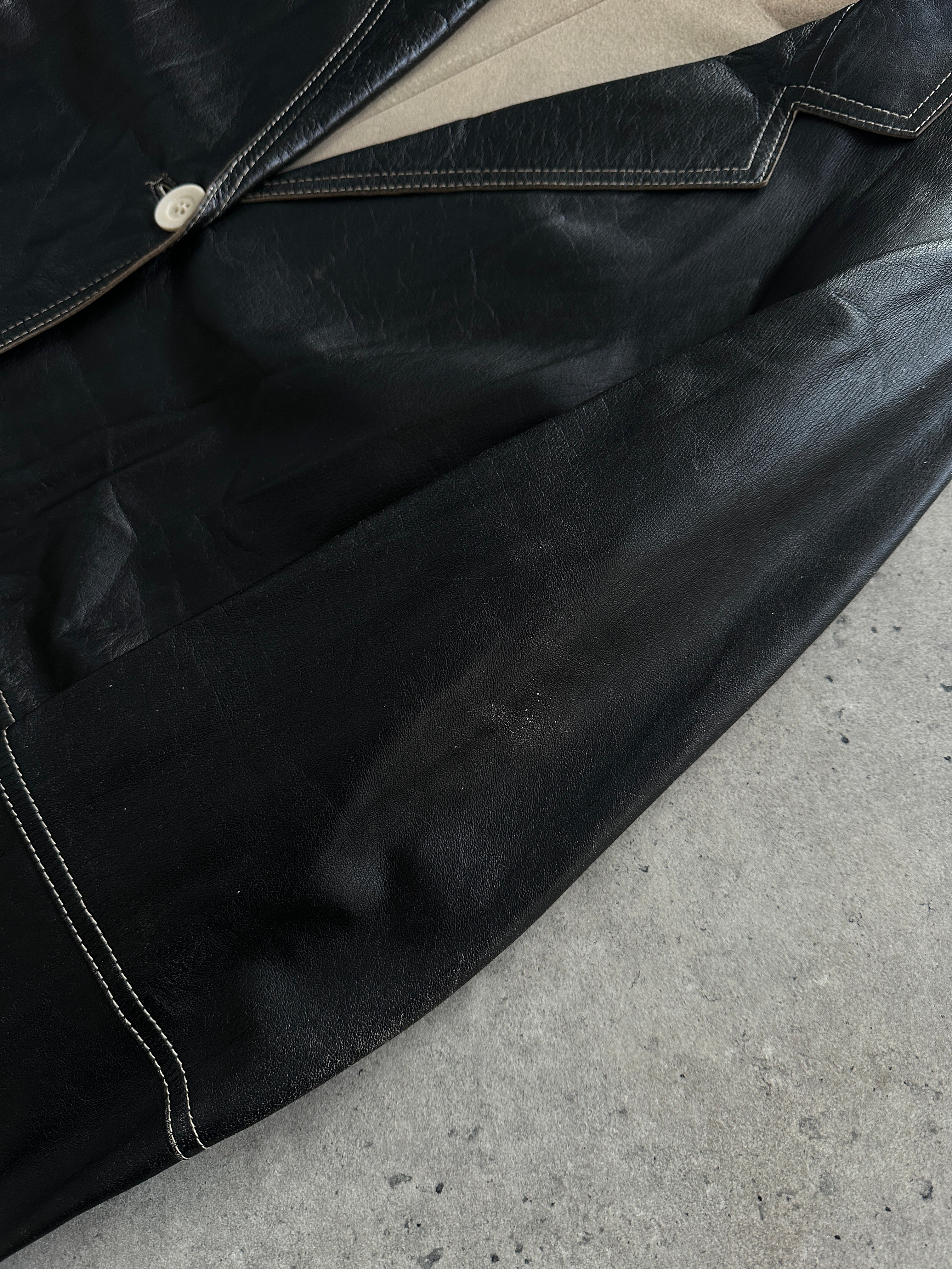 Marella contrast stitch leather jacket in size S, featuring stylish detailing and a classic fit, displayed on a hanger.