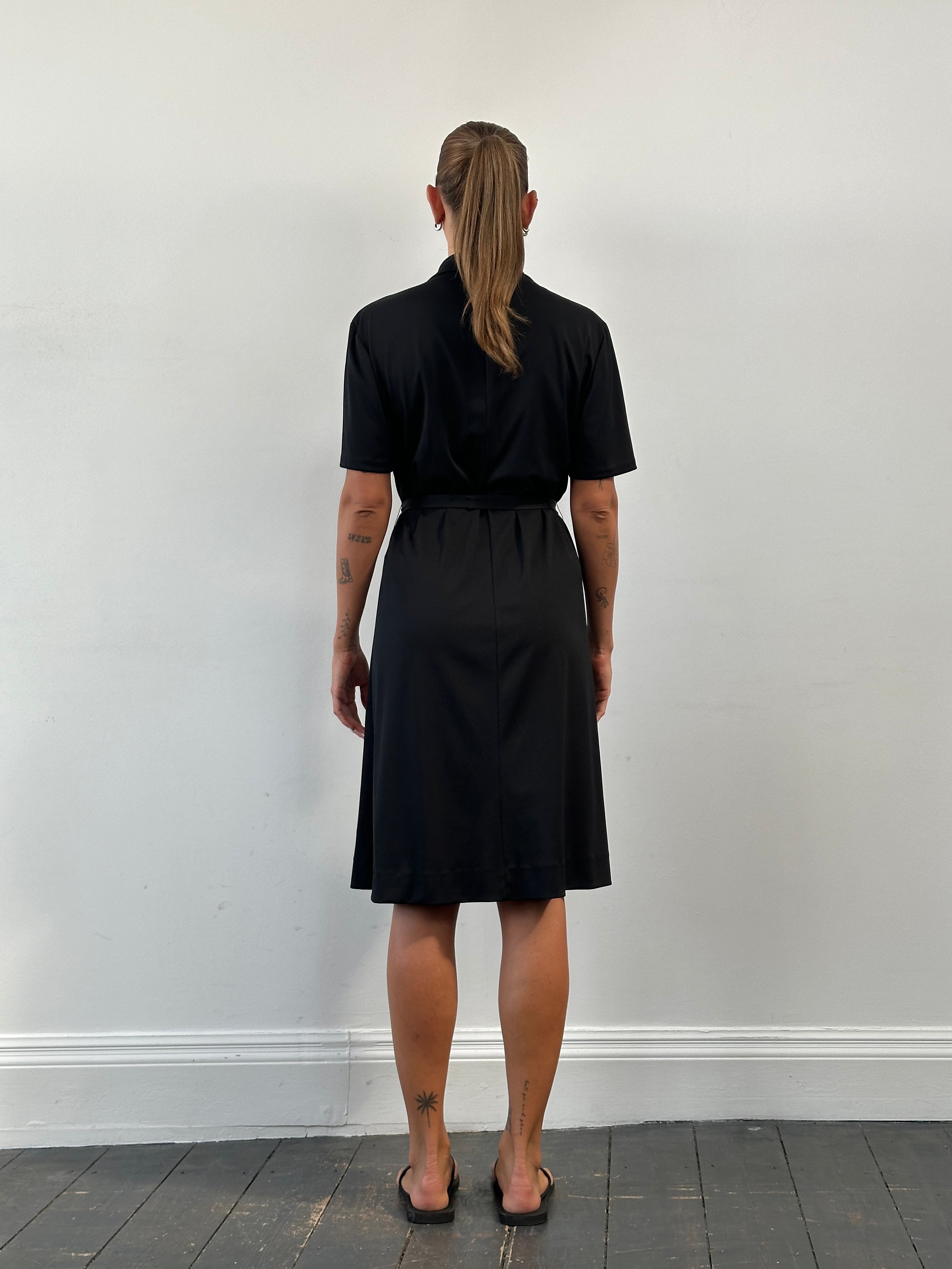Vintage 1990s belted short sleeve midi shirt dress, lightweight fabric, classic collar, and button-front design.