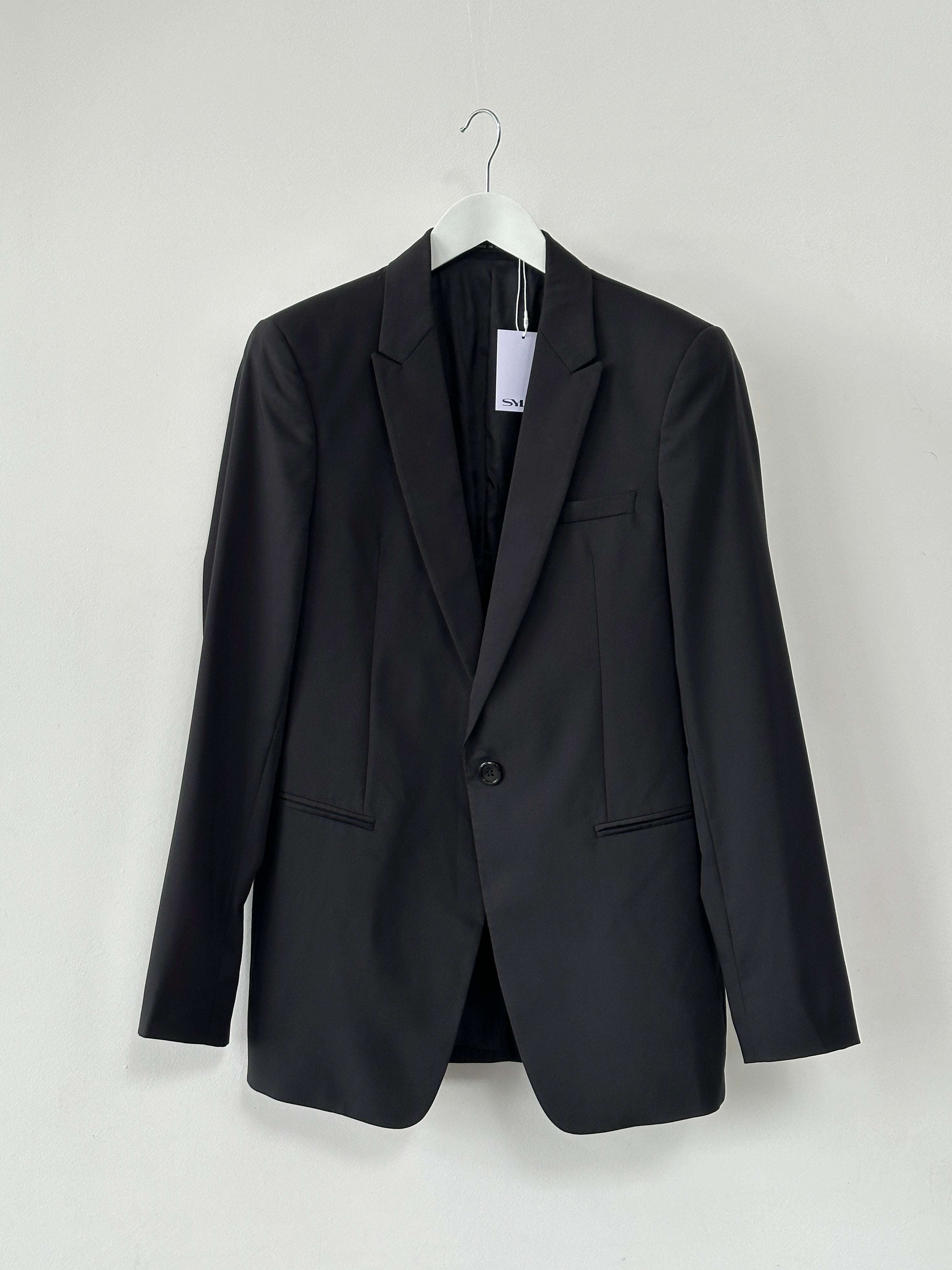 Emporio Armani virgin wool single-breasted blazer in size 38R/M, tailored fit with classic lapels and sleek design.