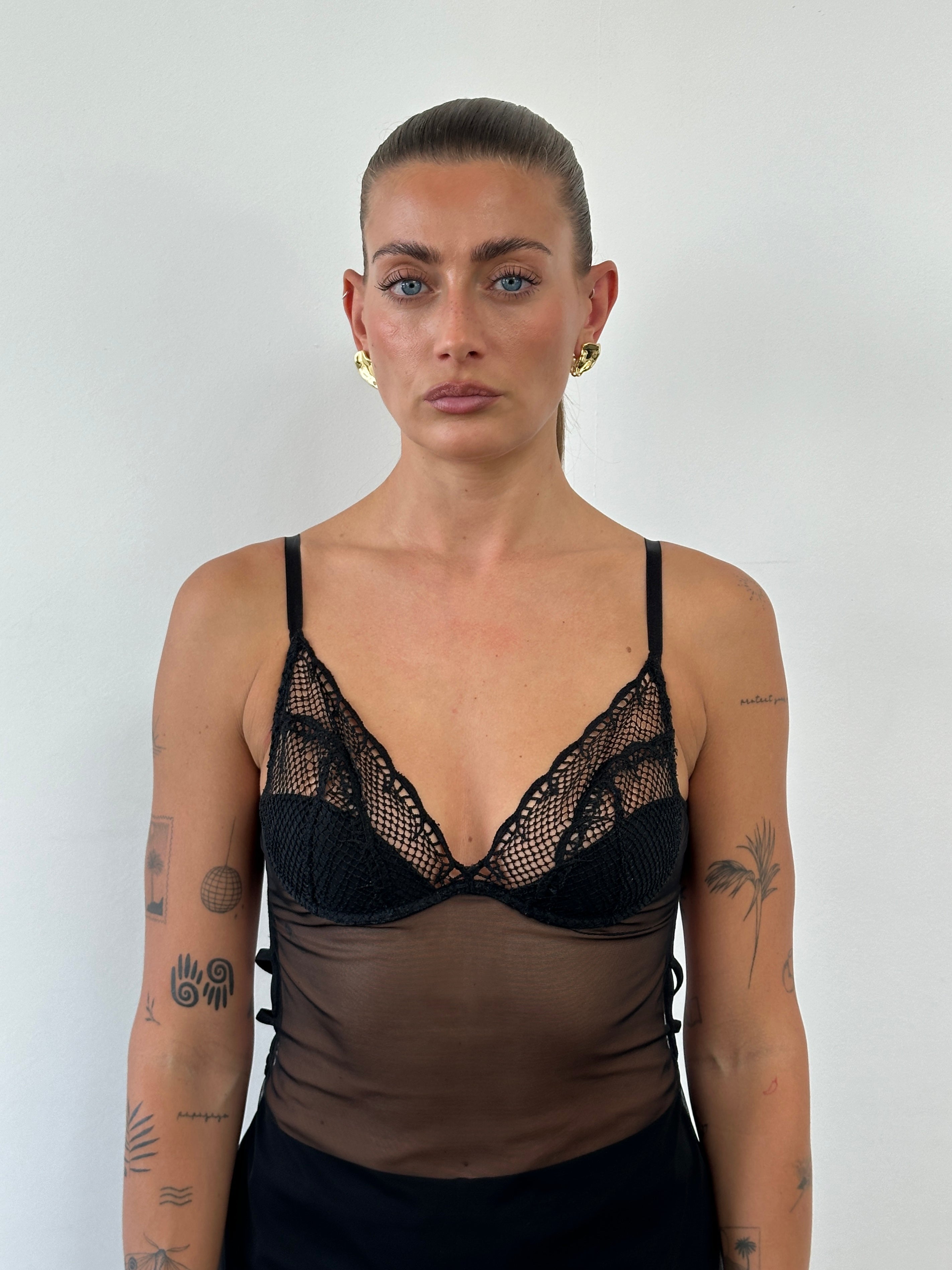 Vintage Italian vintage sheer babydoll lingerie top in size small, featuring delicate, lightweight fabric and elegant design.