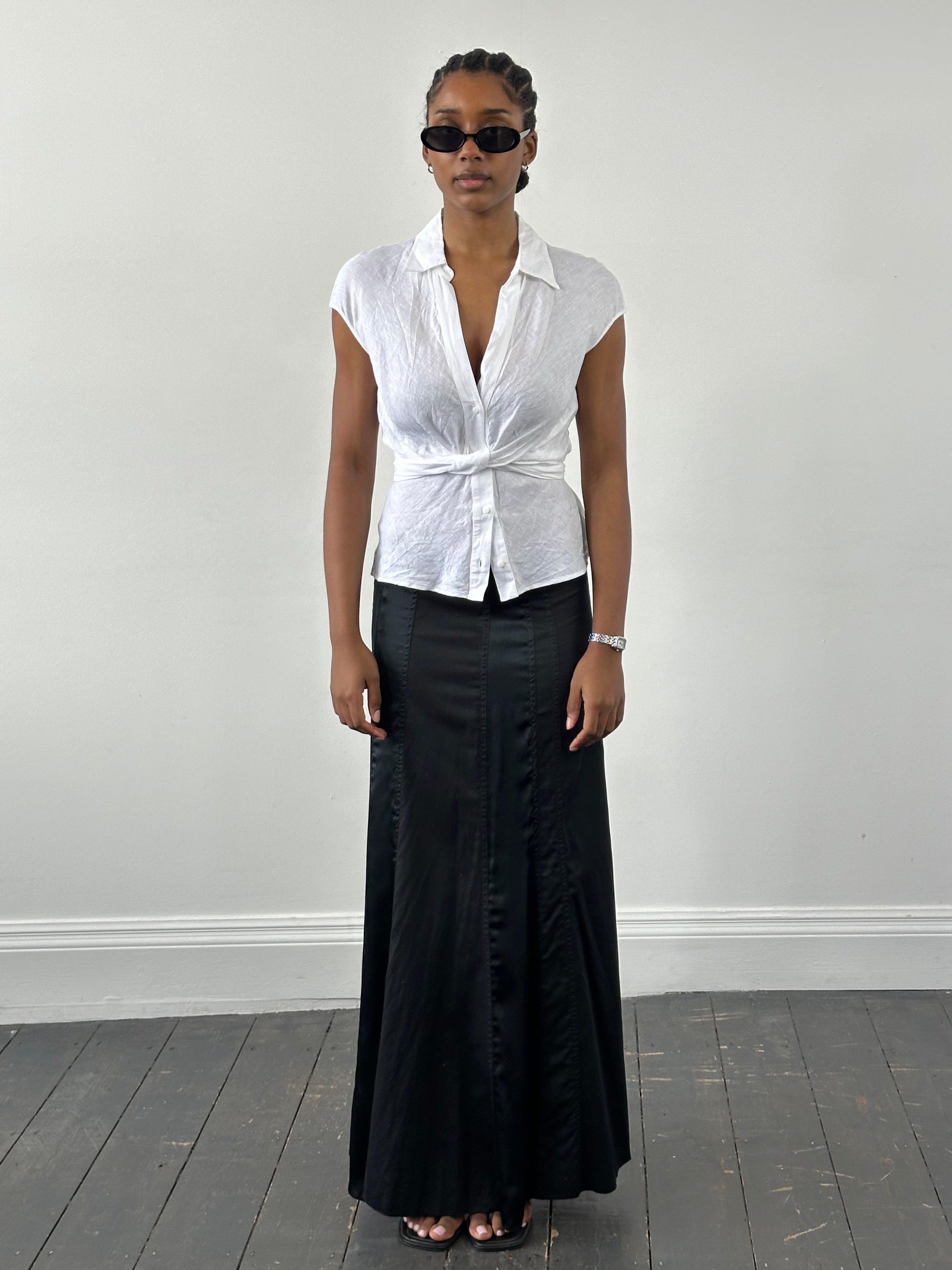 Vintage DKNY cotton panelled skirt in size W28, featuring a 2000s style with color-blocked panels and a fitted silhouette.