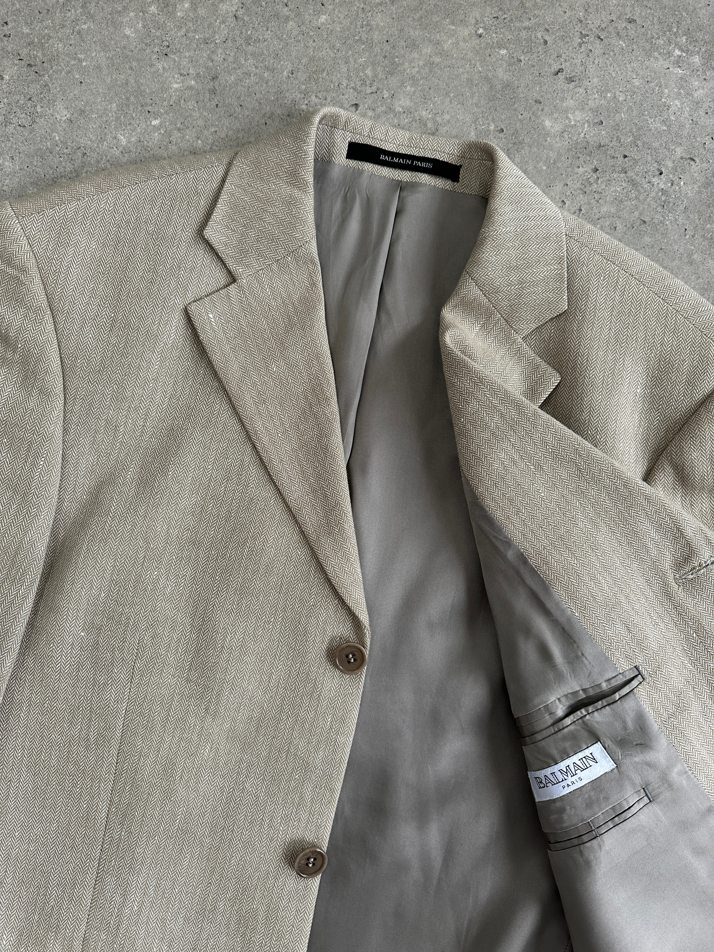 Balmain linen cotton single-breasted blazer in size 38S/M, showcasing tailored fit and classic lapel design.
