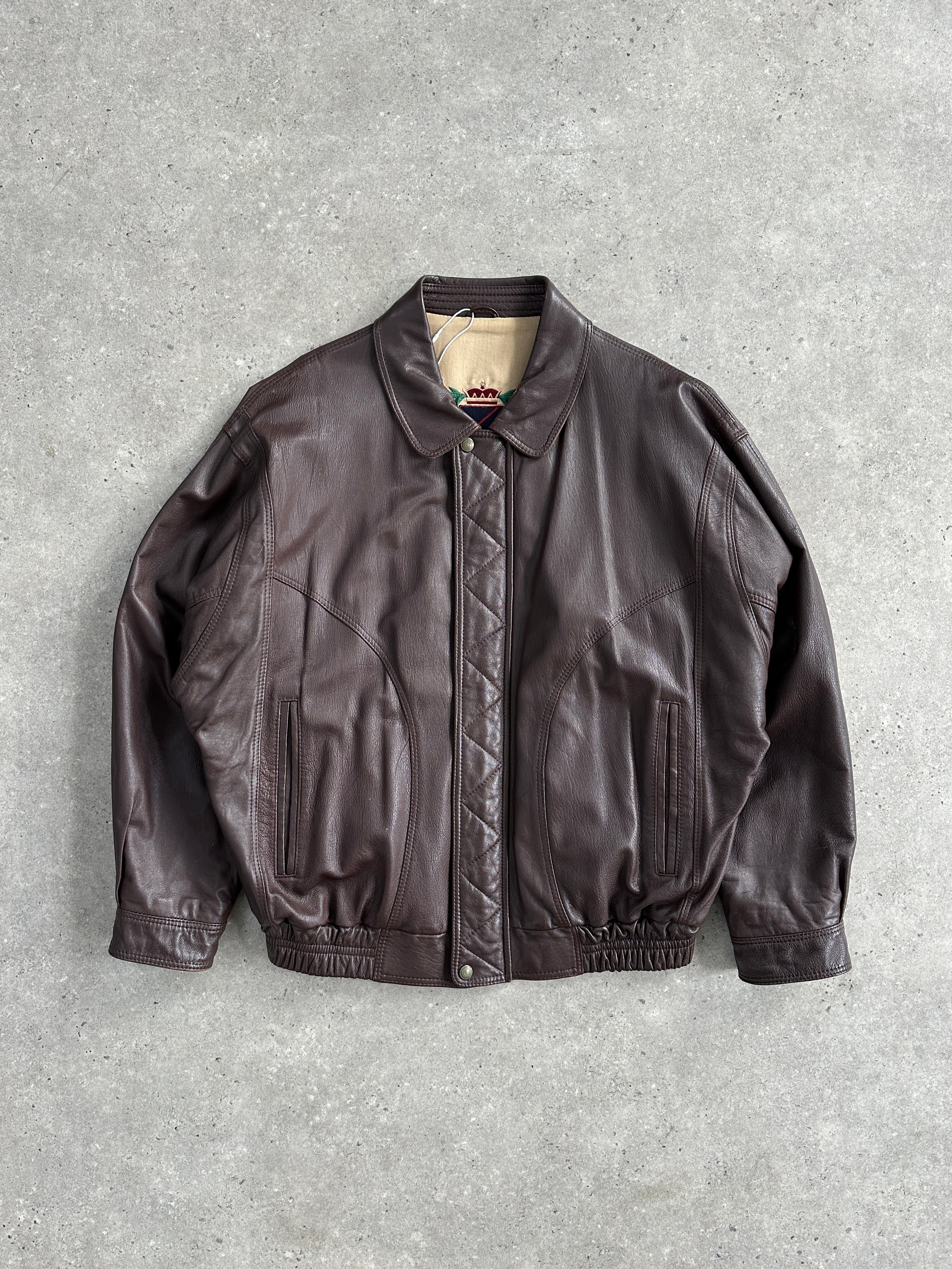 Vintage Jaeger 1980s leather bomber jacket in XL, featuring classic design and rich leather texture.