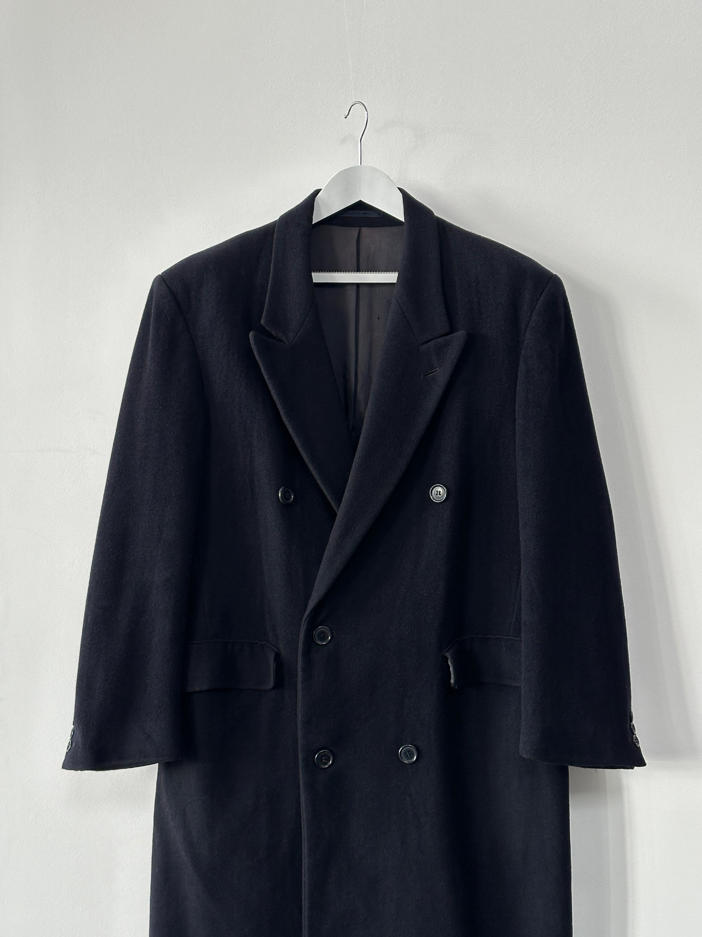 Pierre Cardin wool cashmere double-breasted coat in size L/XL, shown hanging with a tailored fit and classic design.