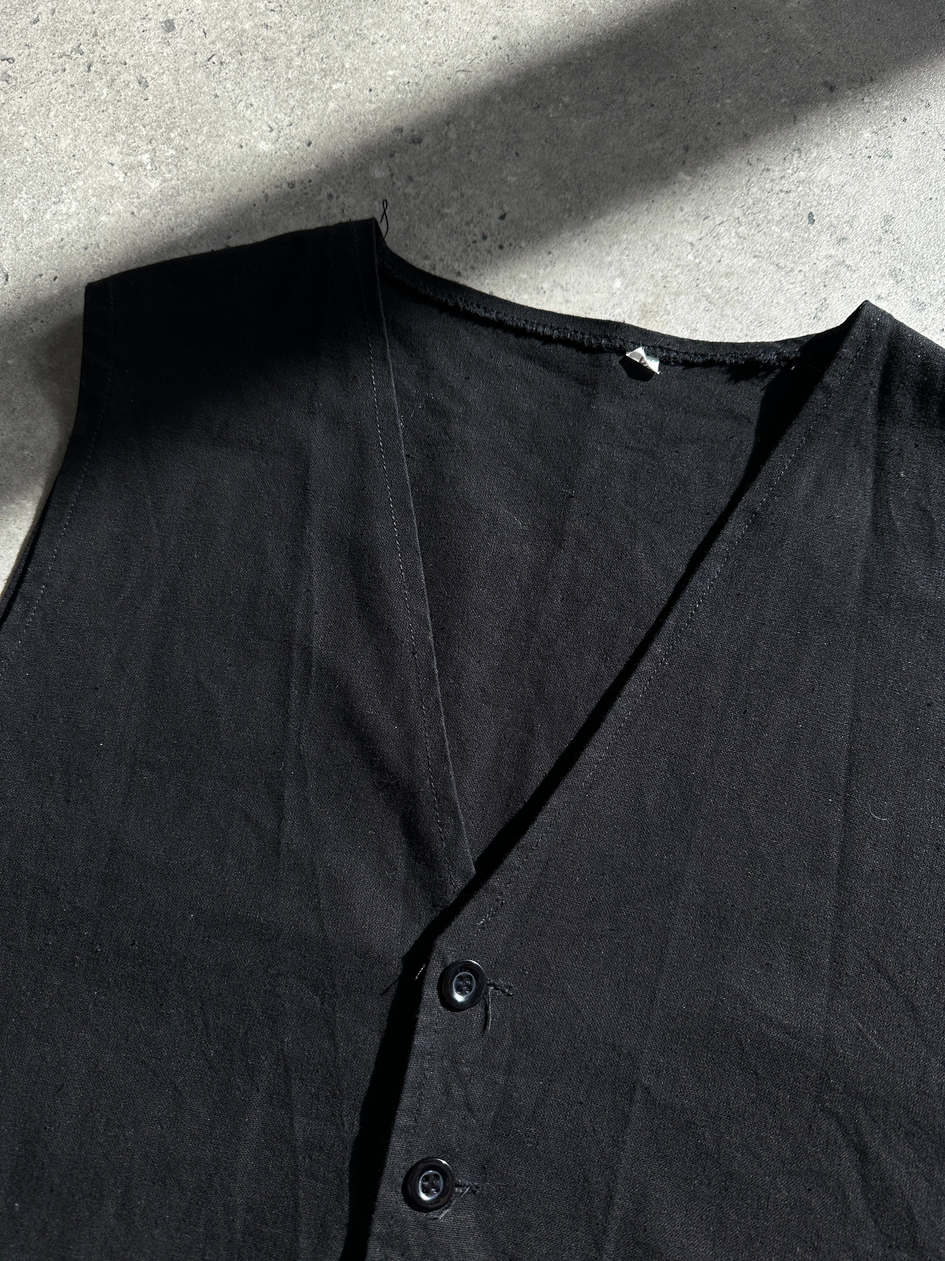 Vintage cotton waistcoat coat in XL size, featuring classic design and button details, ideal for vintage fashion style.