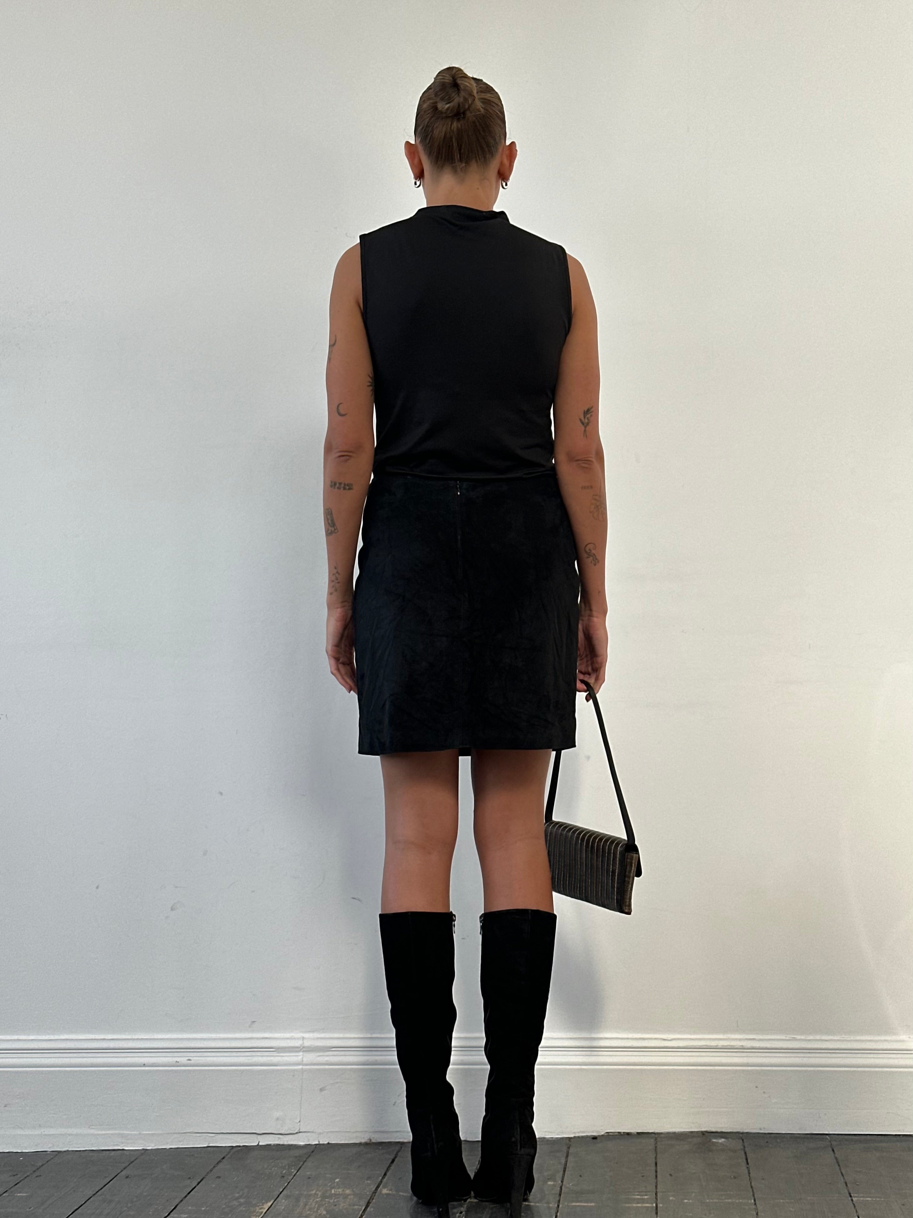Versace 1990s suede mini skirt in size W30, stylish high-waisted skirt with a smooth suede finish and classic design.