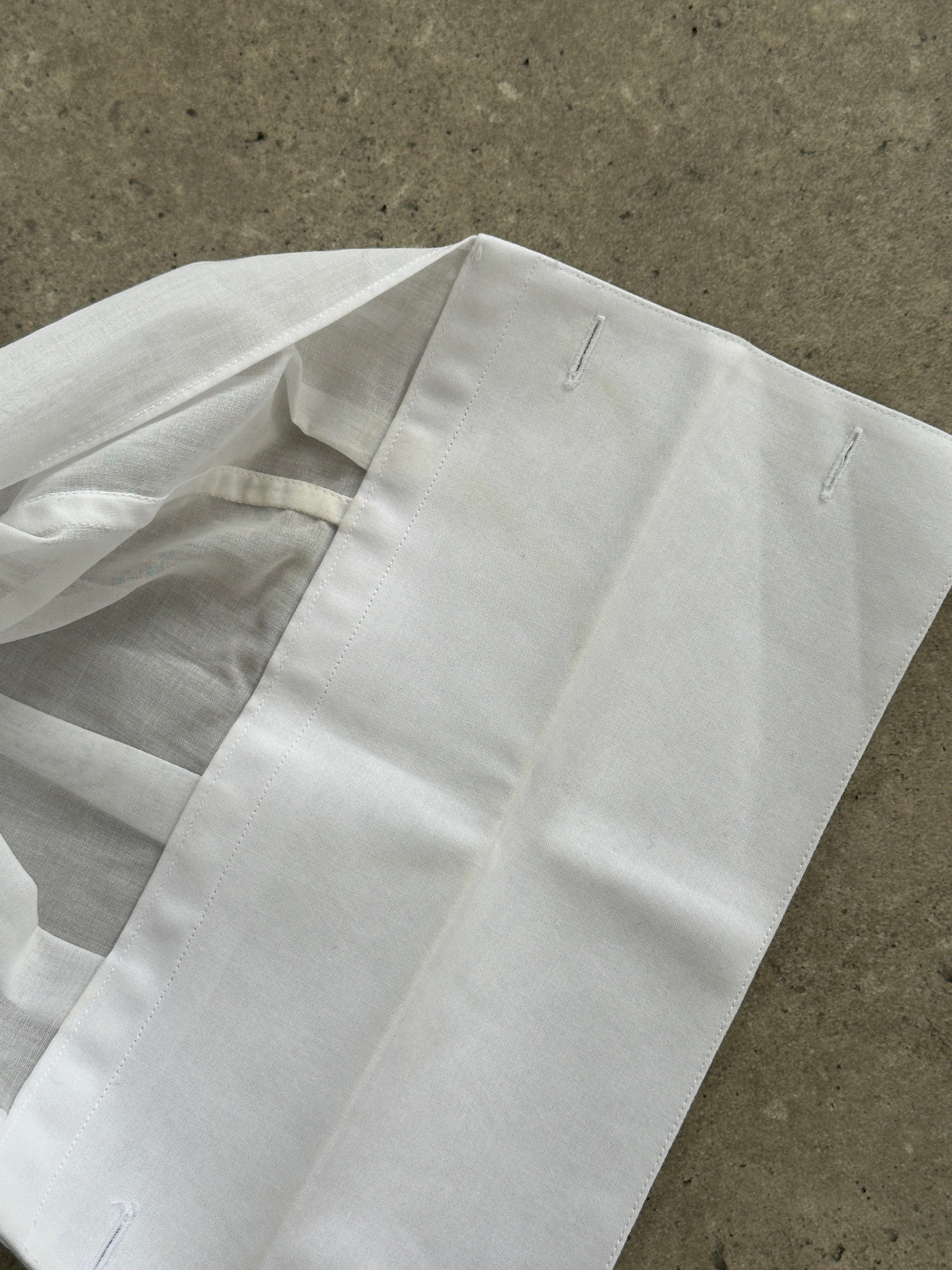 Pal Zileri sheer wing collar dress shirt in XL, featuring a lightweight fabric and elegant design, showcased on a hanger.