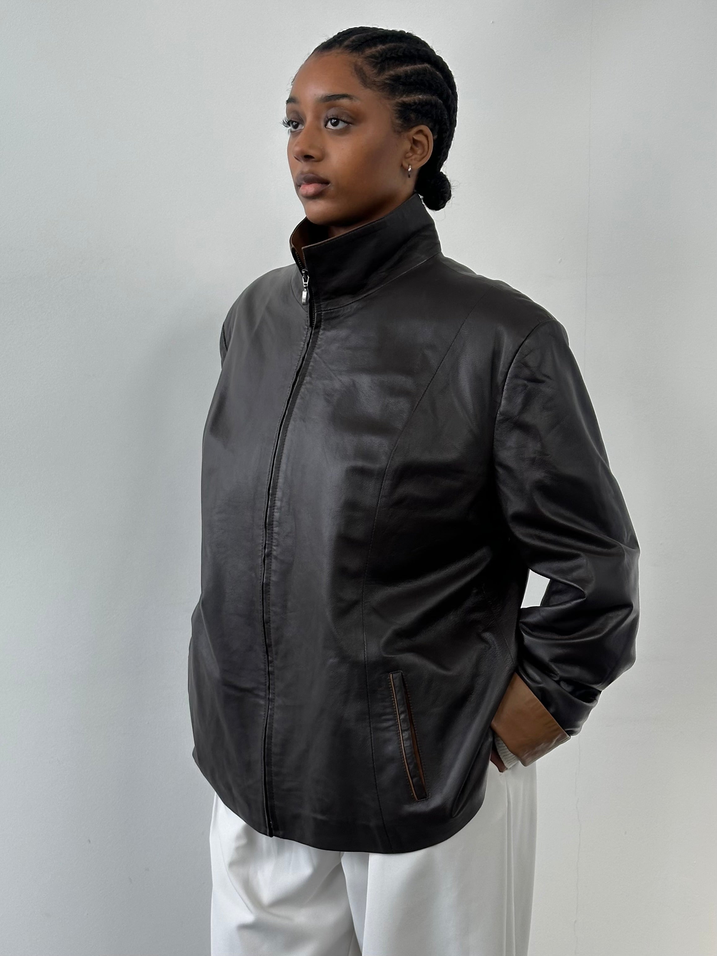 Vintage 1990s high neck leather jacket with contrast panels, size XL, featuring classic vintage leather styling and detailing.