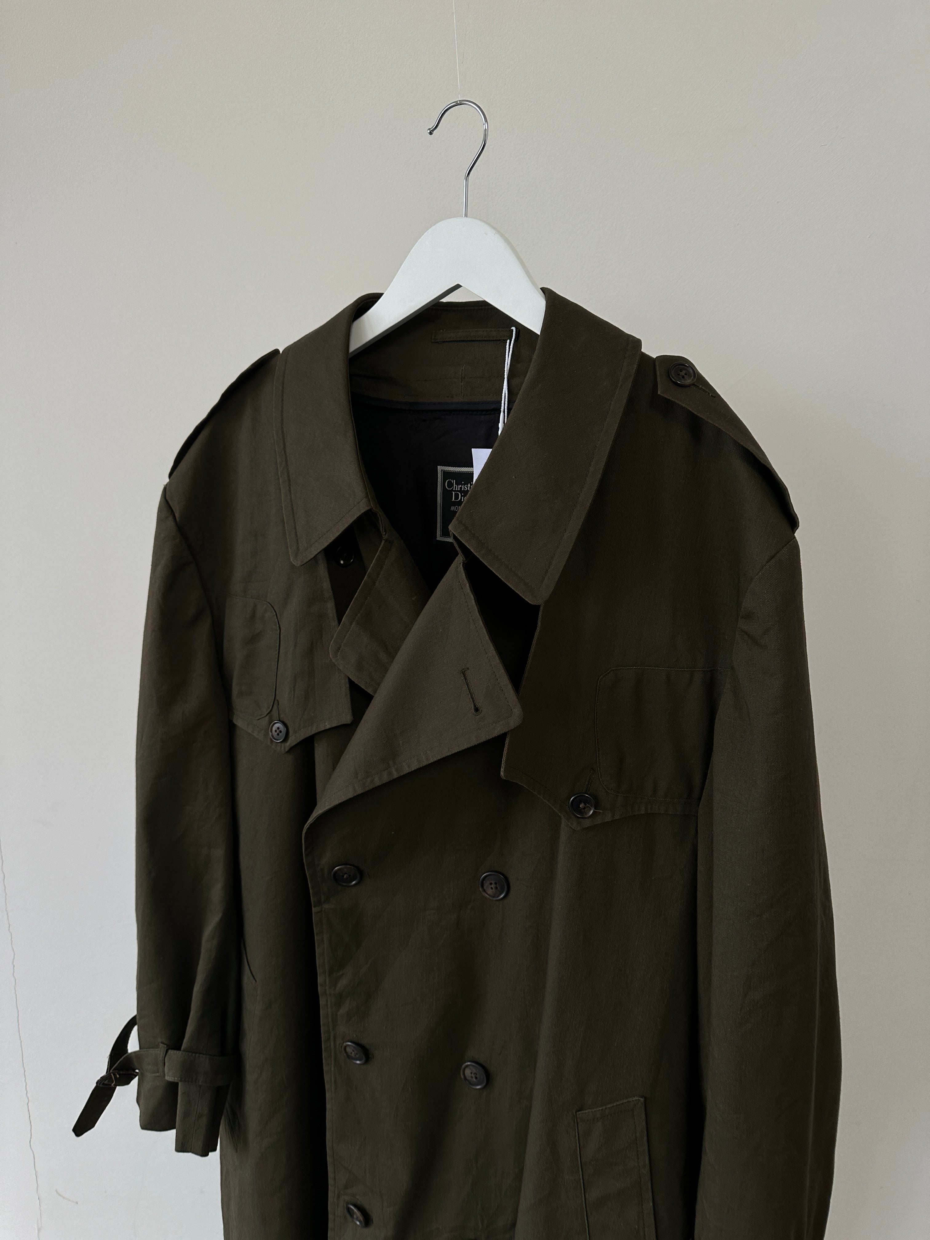 Christian Dior cotton double-breasted trench coat in size XL displayed on a mannequin, showcasing classic style and tailored design.