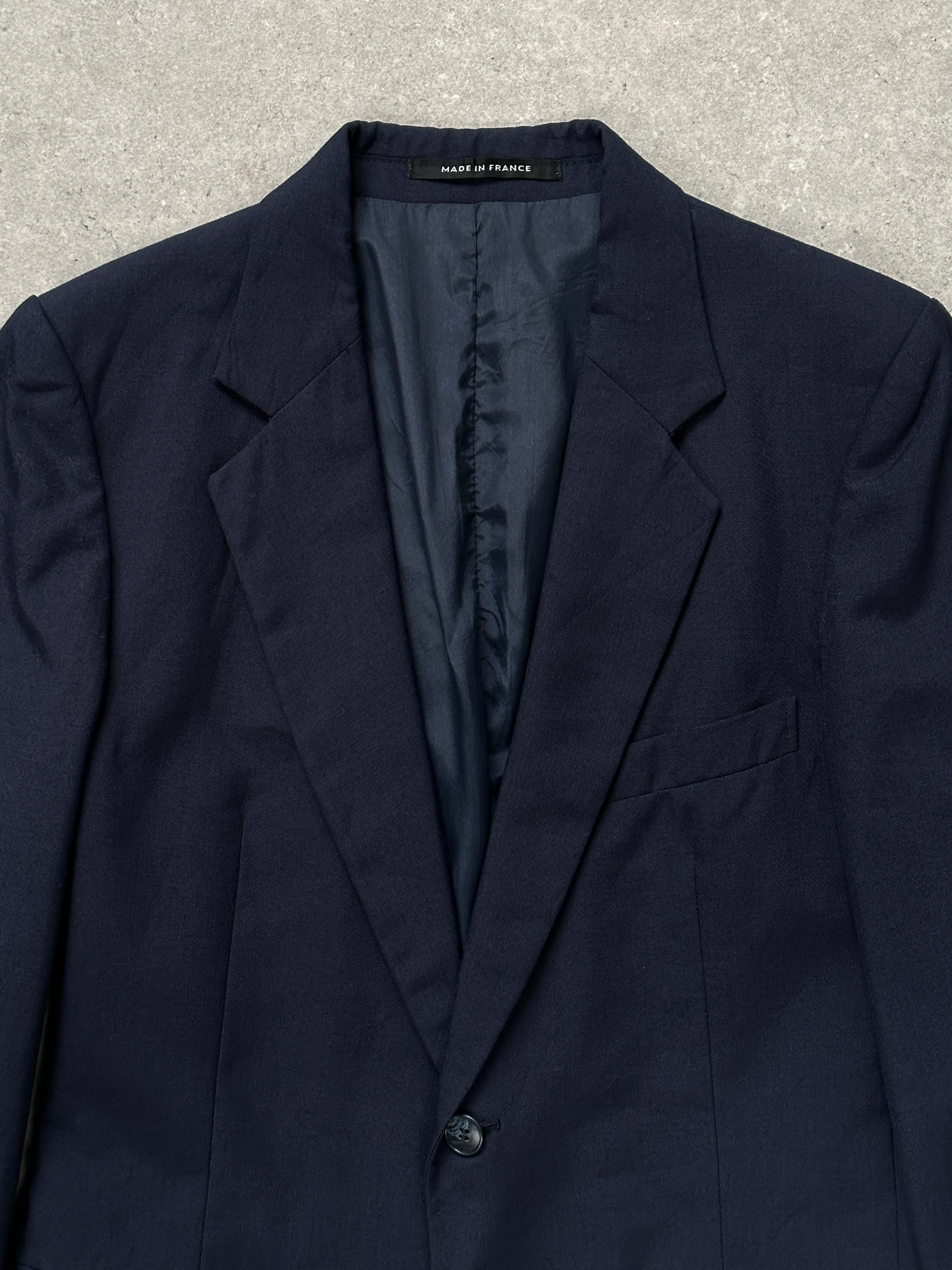 Yves Saint Laurent 1990s pure wool single-breasted blazer in size 36R/S, tailored fit with classic lapel and button closure.