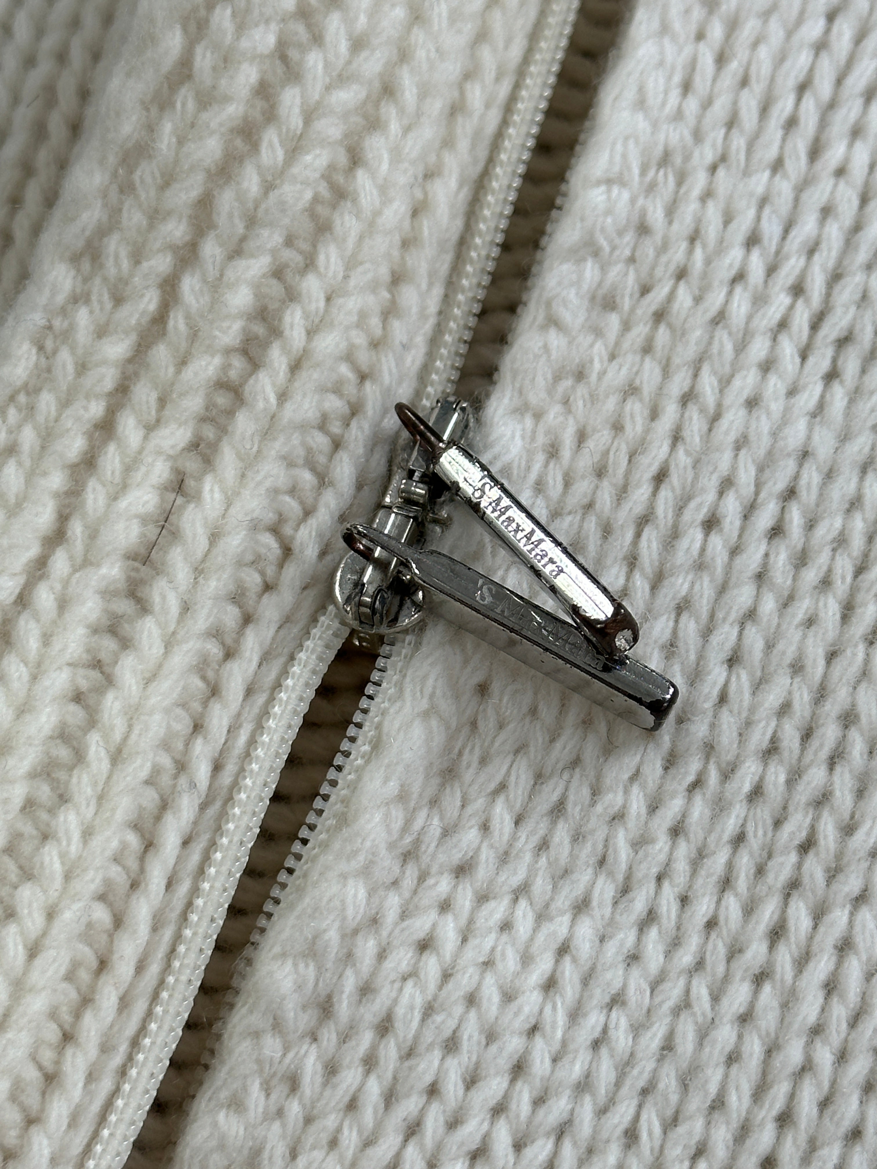 Max Mara wool cashmere knitted double zip cardigan in size S/M, shown with front view and dual zippers.