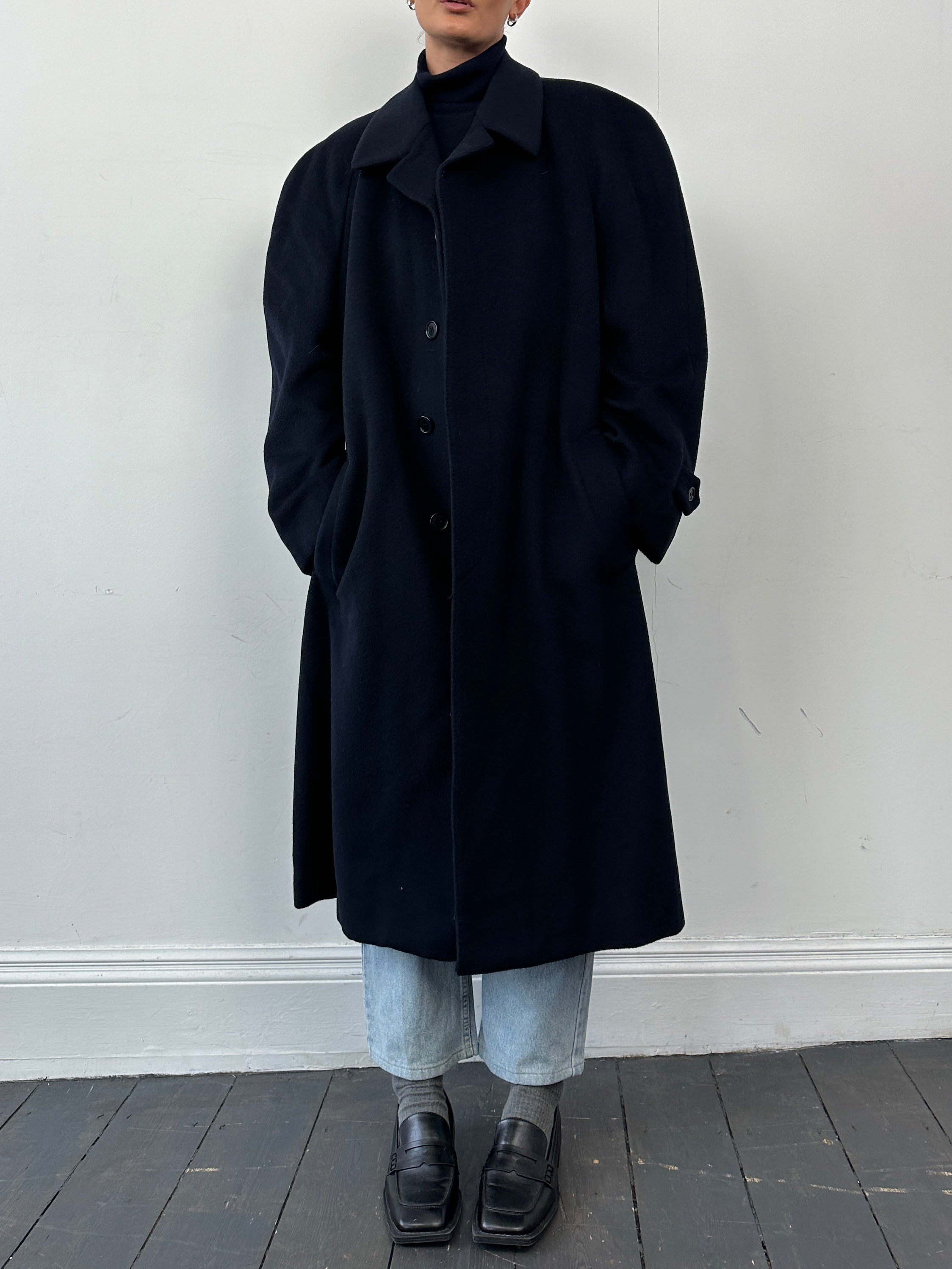 Vintage wool and cashmere coat with concealed placket, single-breasted design, in XL/XXL size, displayed on a hanger.