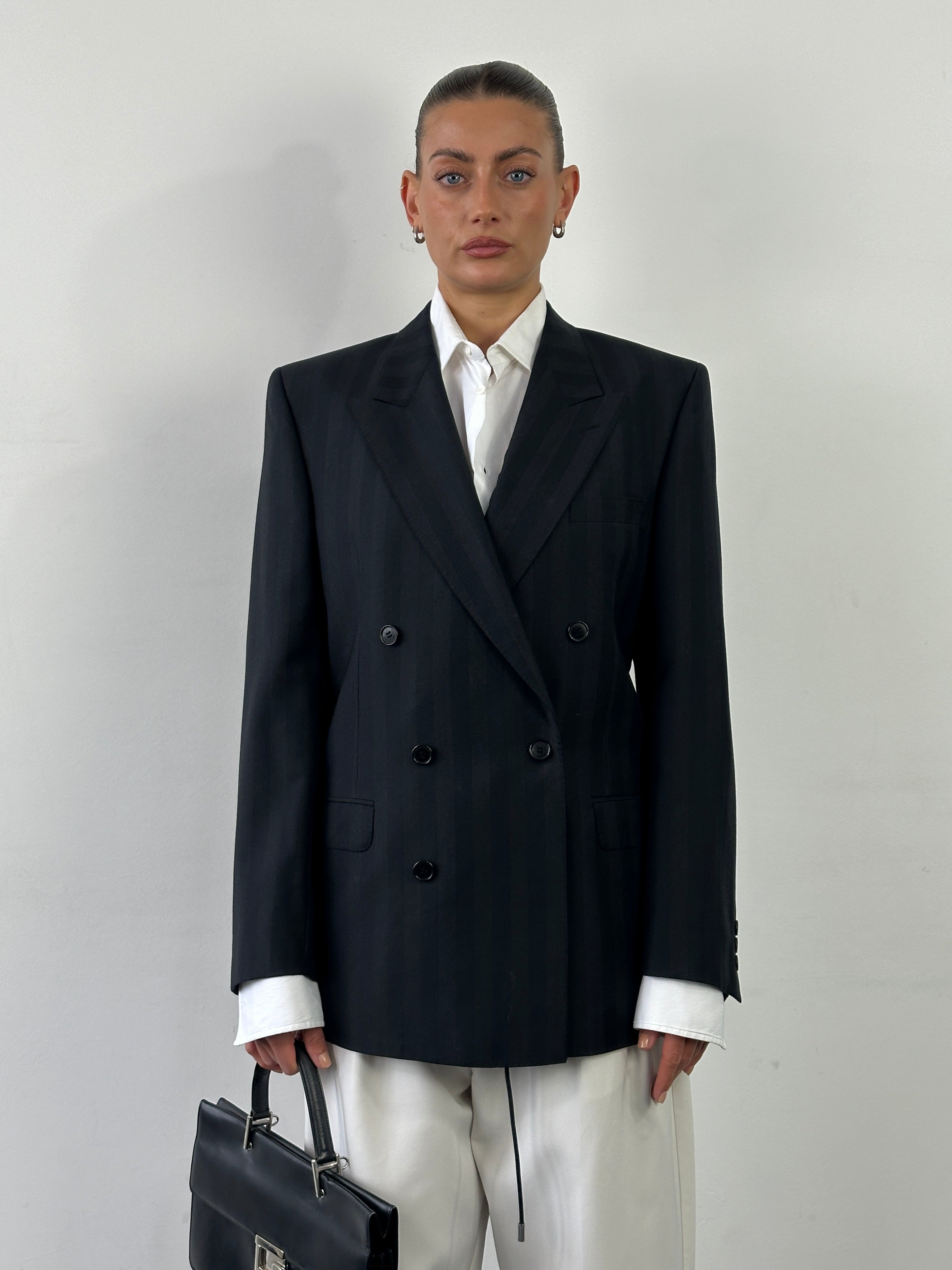 Vintage Italian vintage pure wool stripe double-breasted blazer in size 40R/M, featuring classic tailored design and bold stripe pattern.