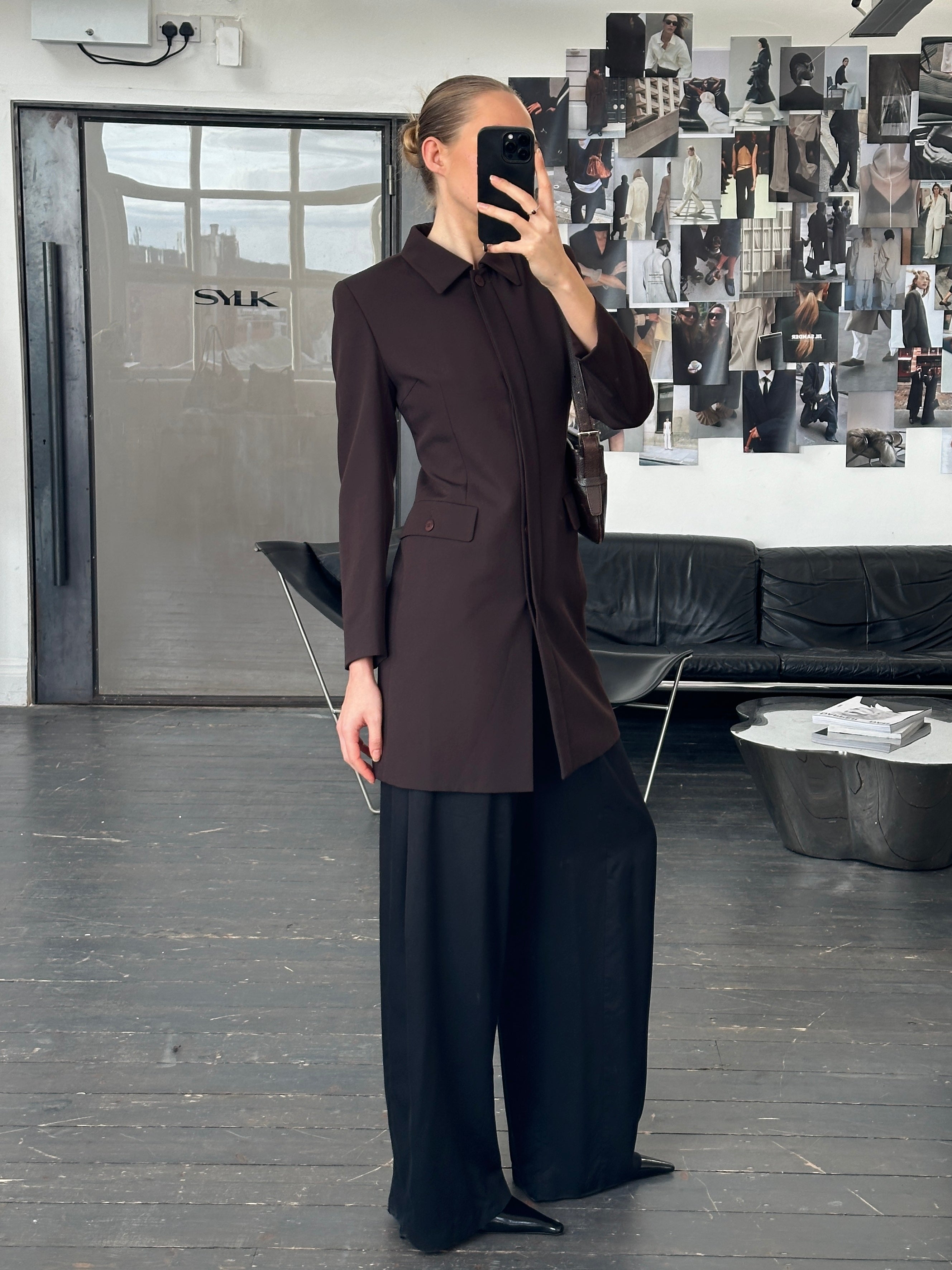 Vintage Italian 1990s minimalist tailored coat in XS/S, showcasing classic design and refined craftsmanship.
