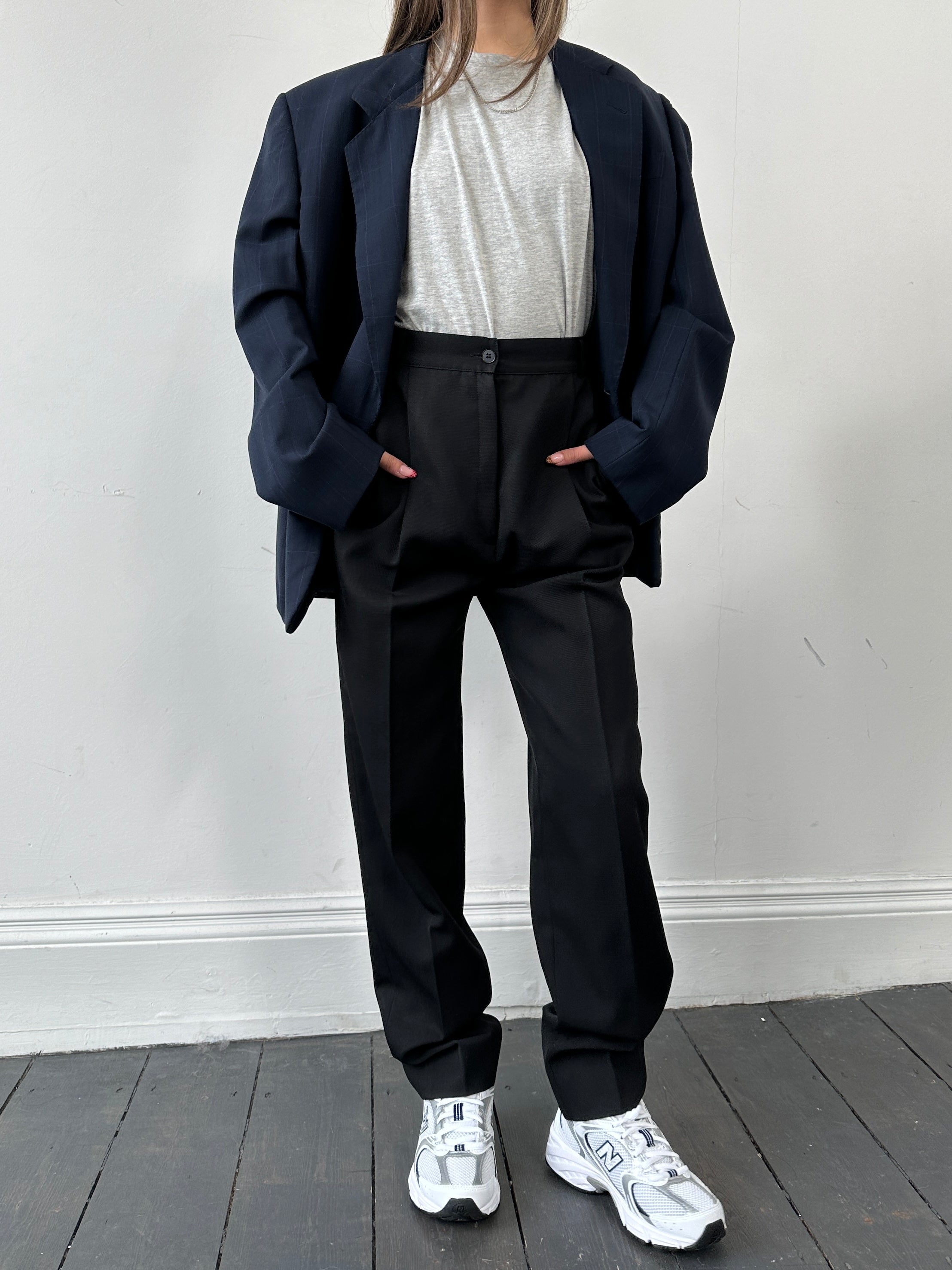 Luisa Spagnoli wool tapered leg tailored trousers in W26, showing a close-up of the tailored fit and fabric texture.