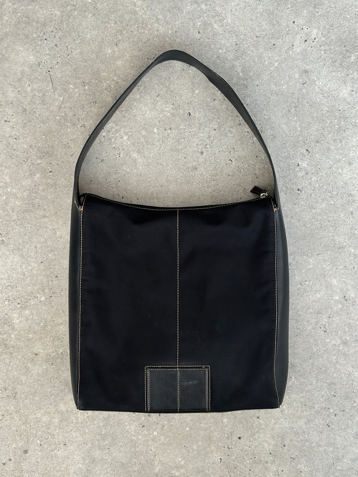 Donna Karan DKNY 2000s contrast stitch shoulder bag with structured design and shoulder strap, featuring stylish contrast stitching details.