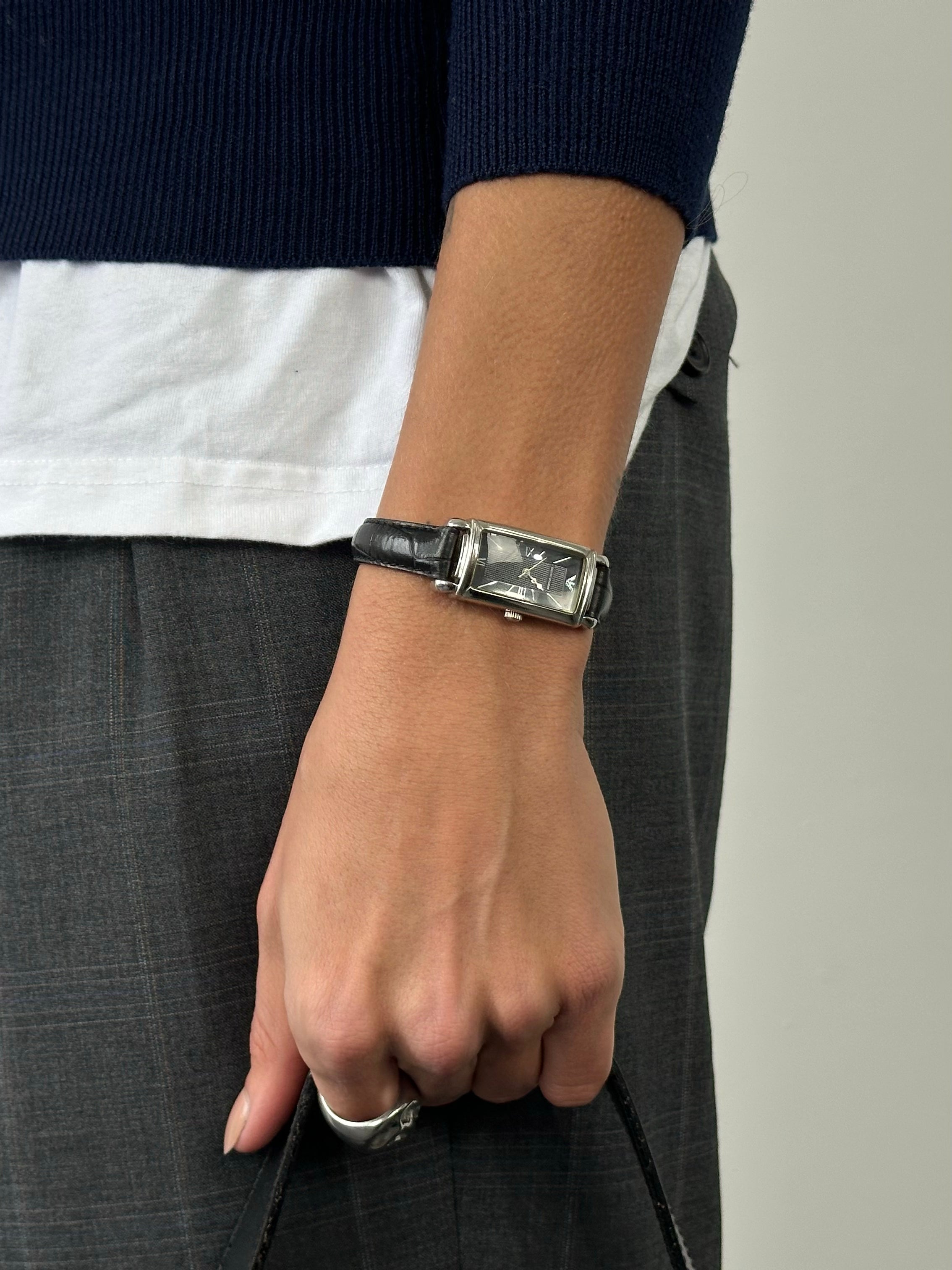 Emporio Armani 2000s leather watch with sleek round dial and classic black leather strap, stylish accessory for men or women.