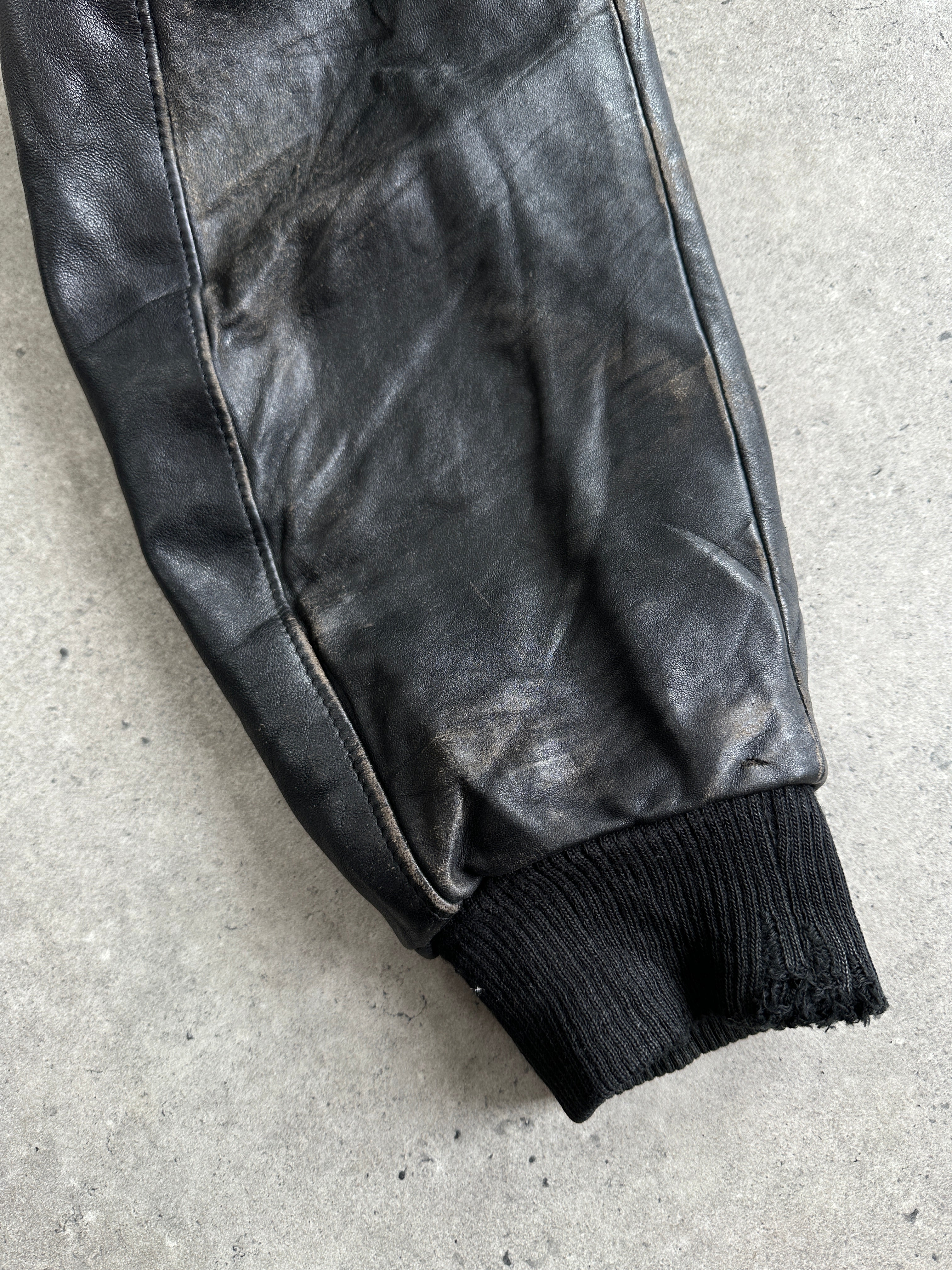 Vintage Italian leather bomber jacket with removable fleece lining, size large, stylish and warm men's outerwear