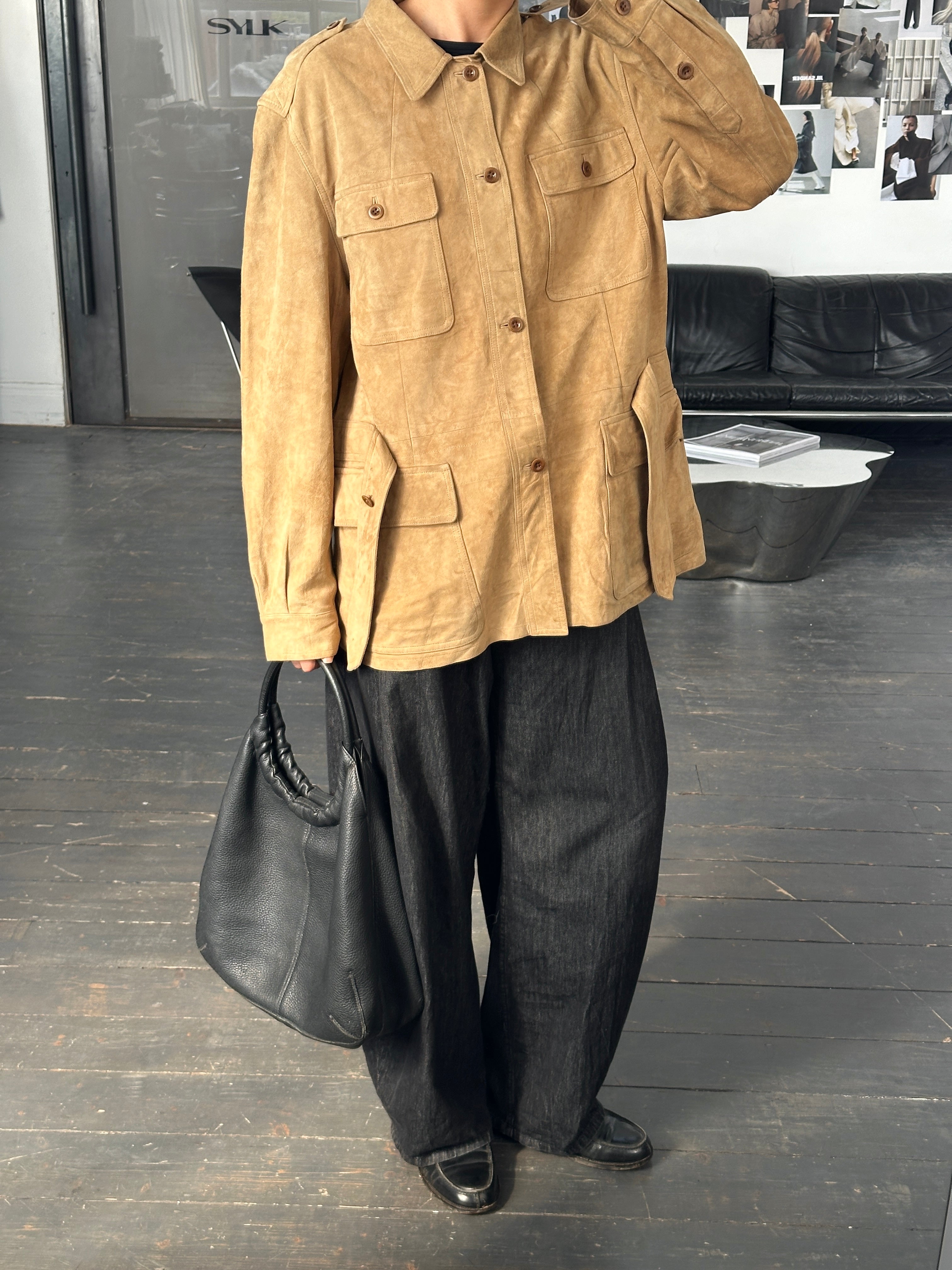Ralph Lauren Polo 2000s safari suede jacket in XL, featuring classic design and tan color, displayed on a hanger.