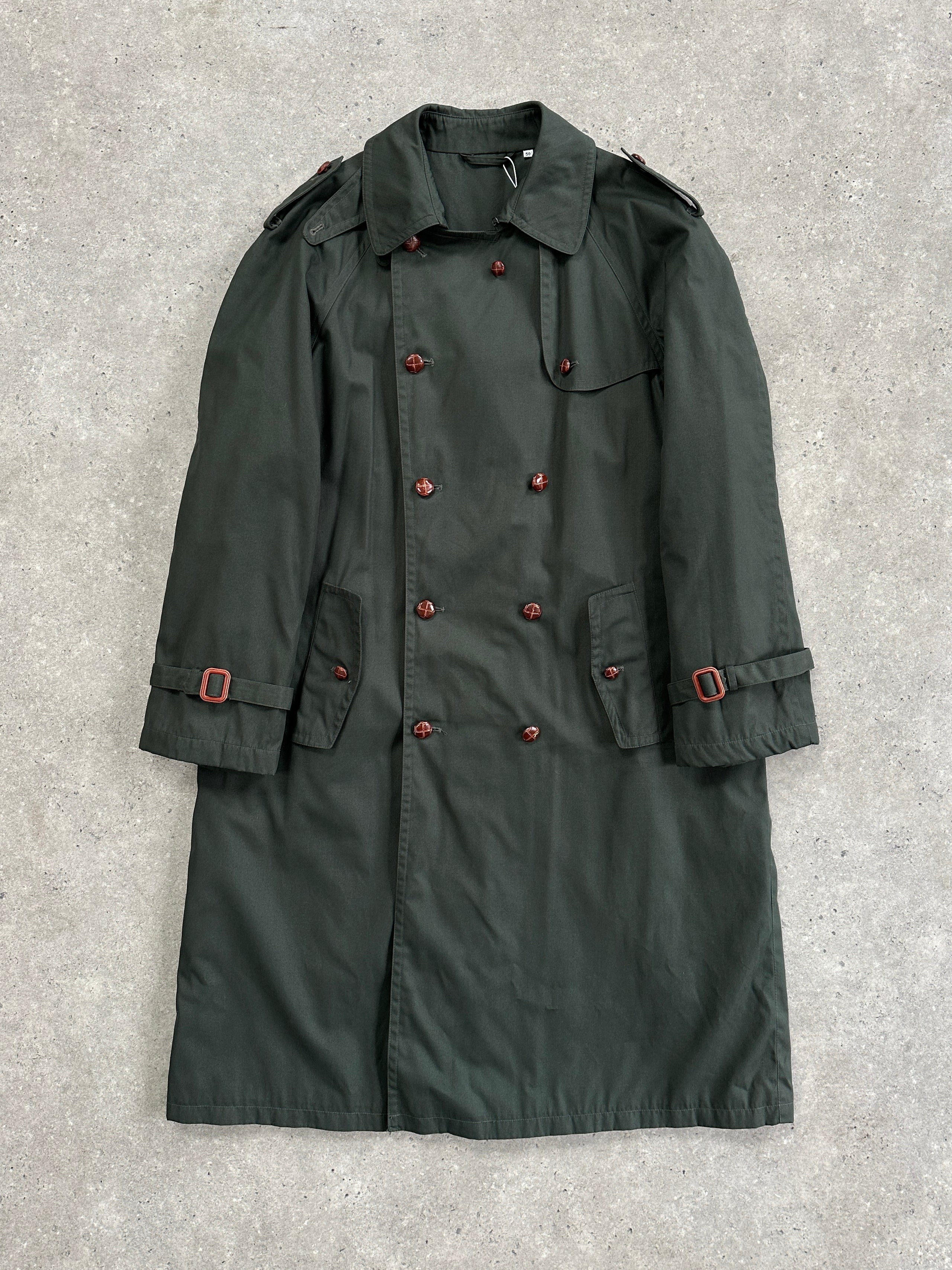 Vintage double-breasted trench coat in XL/XXL size, classic style with belt and shoulder epaulets, made from durable fabric.