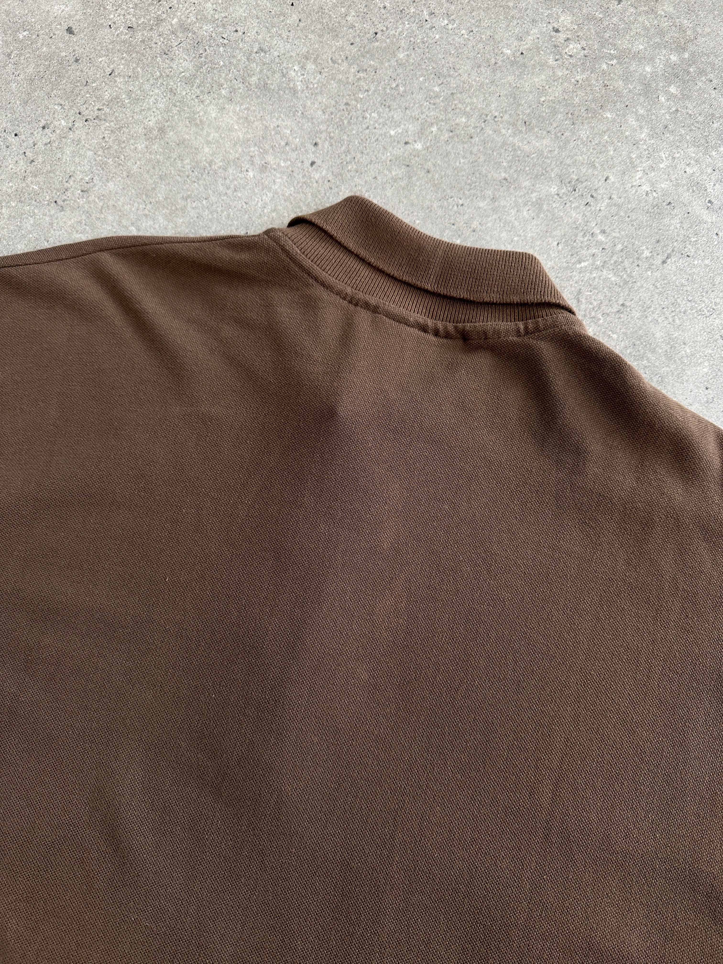 Fendi cotton logo polo jumper in size L/XL, cream-colored knit with Fendi branding, displayed on a hanger.