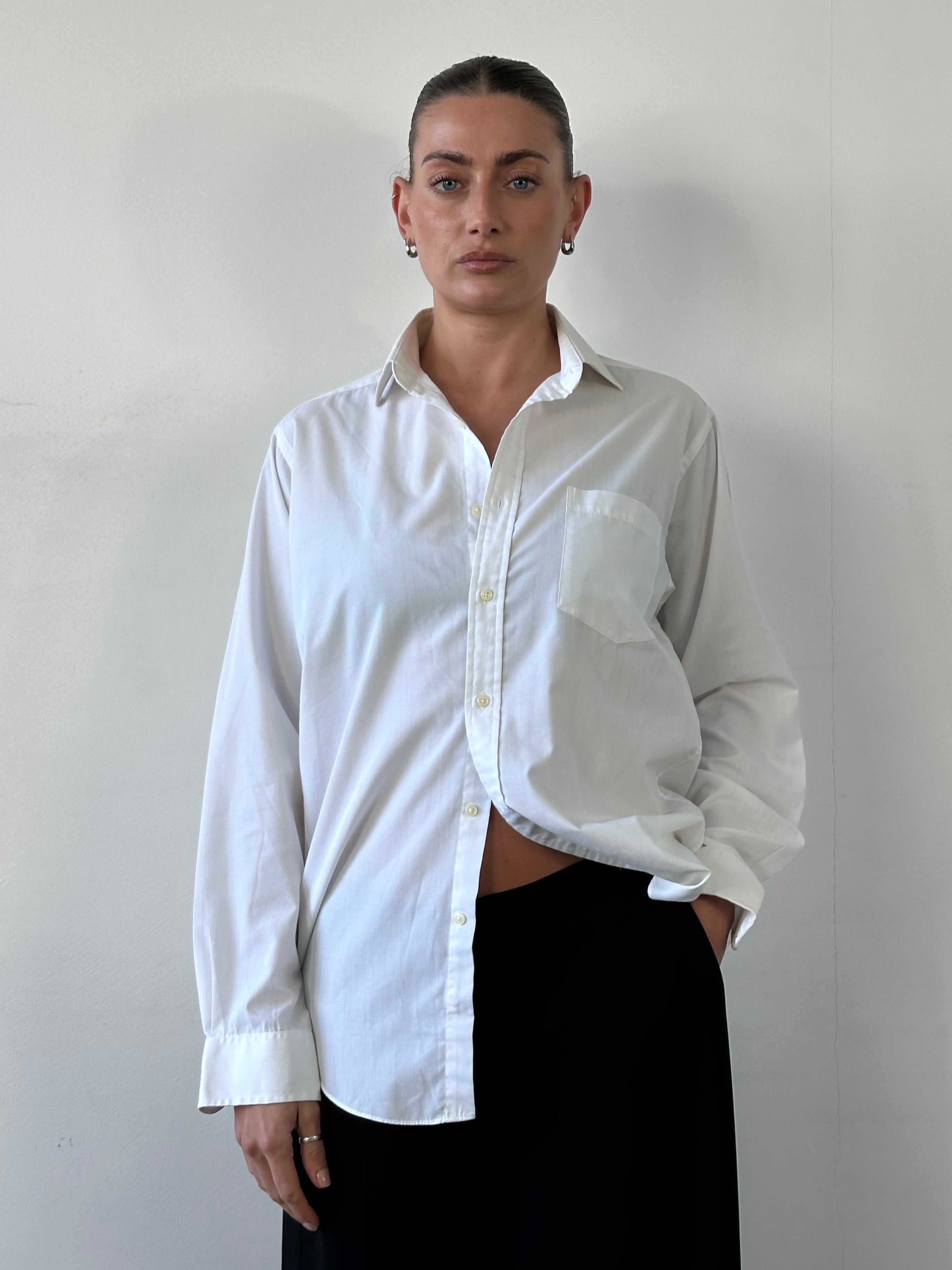 Christian Dior Monsieur cotton logo shirt in size M/L, featuring the brand's signature design and classic white fabric.