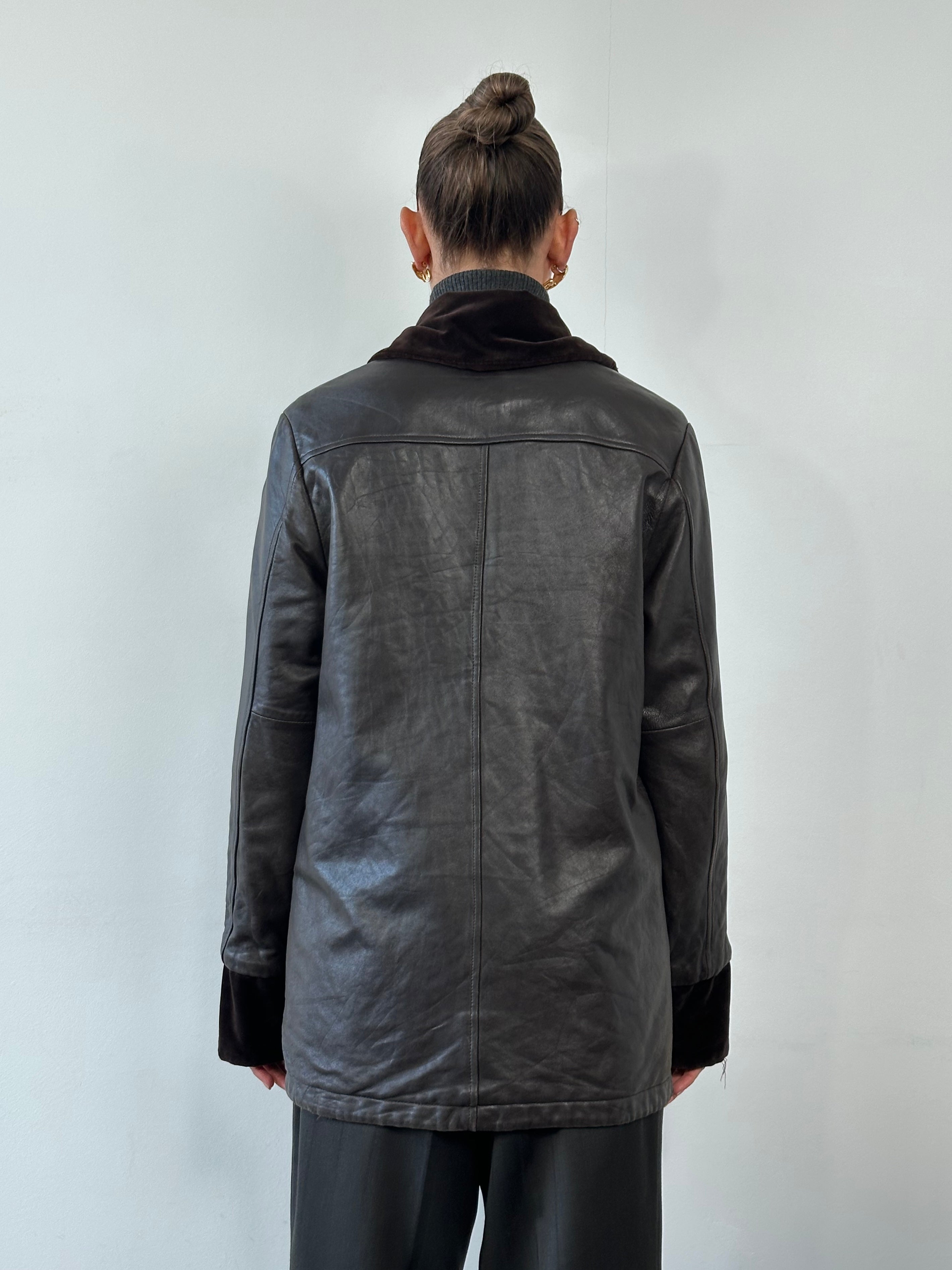 Kenneth Cole 1990s reversible leather and velvet jacket in size M, featuring black leather on one side and velvet on the other.
