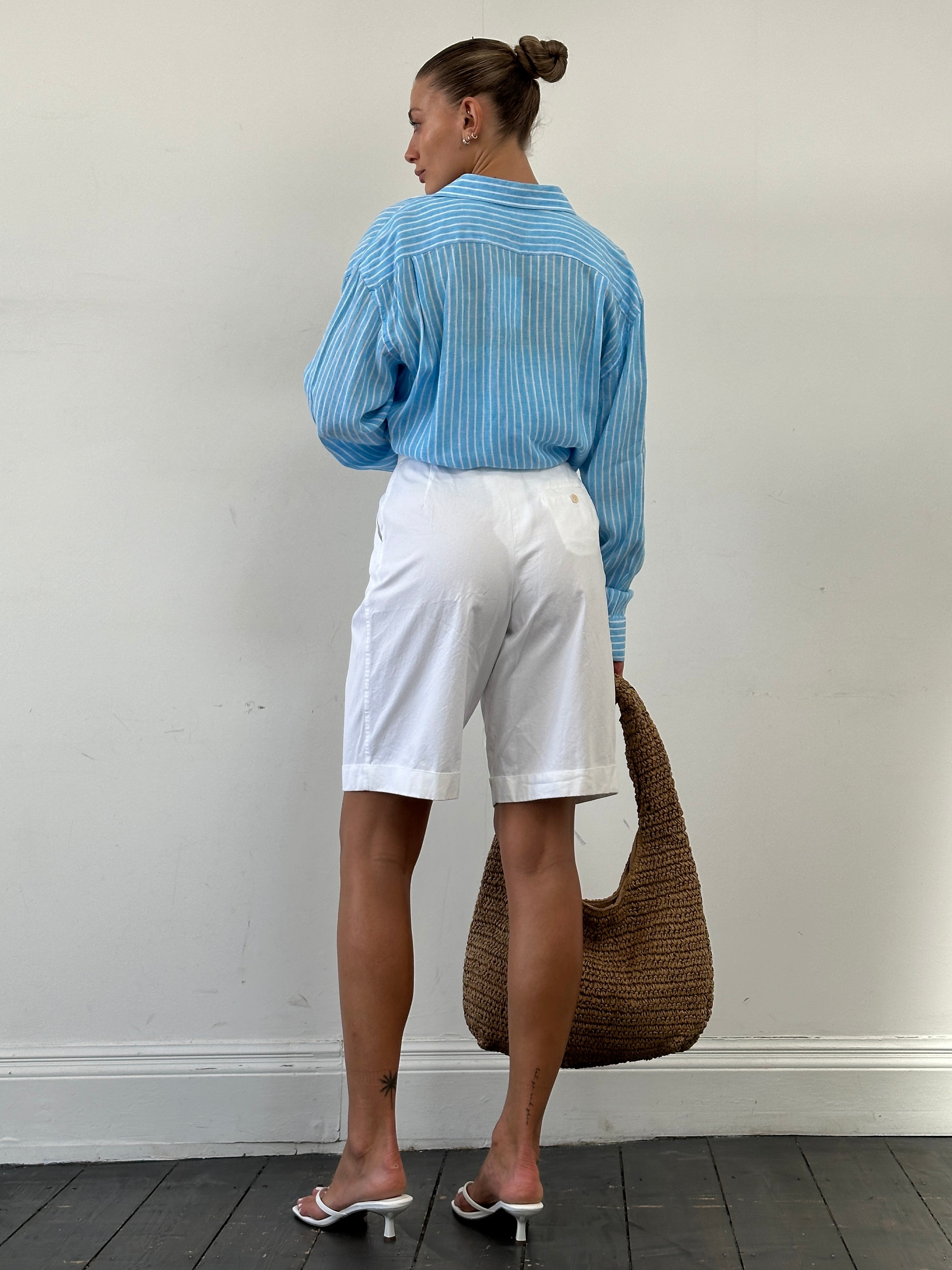 Max Mara high-waisted cotton Bermuda shorts in white, featuring a tailored fit and classic design, front view.