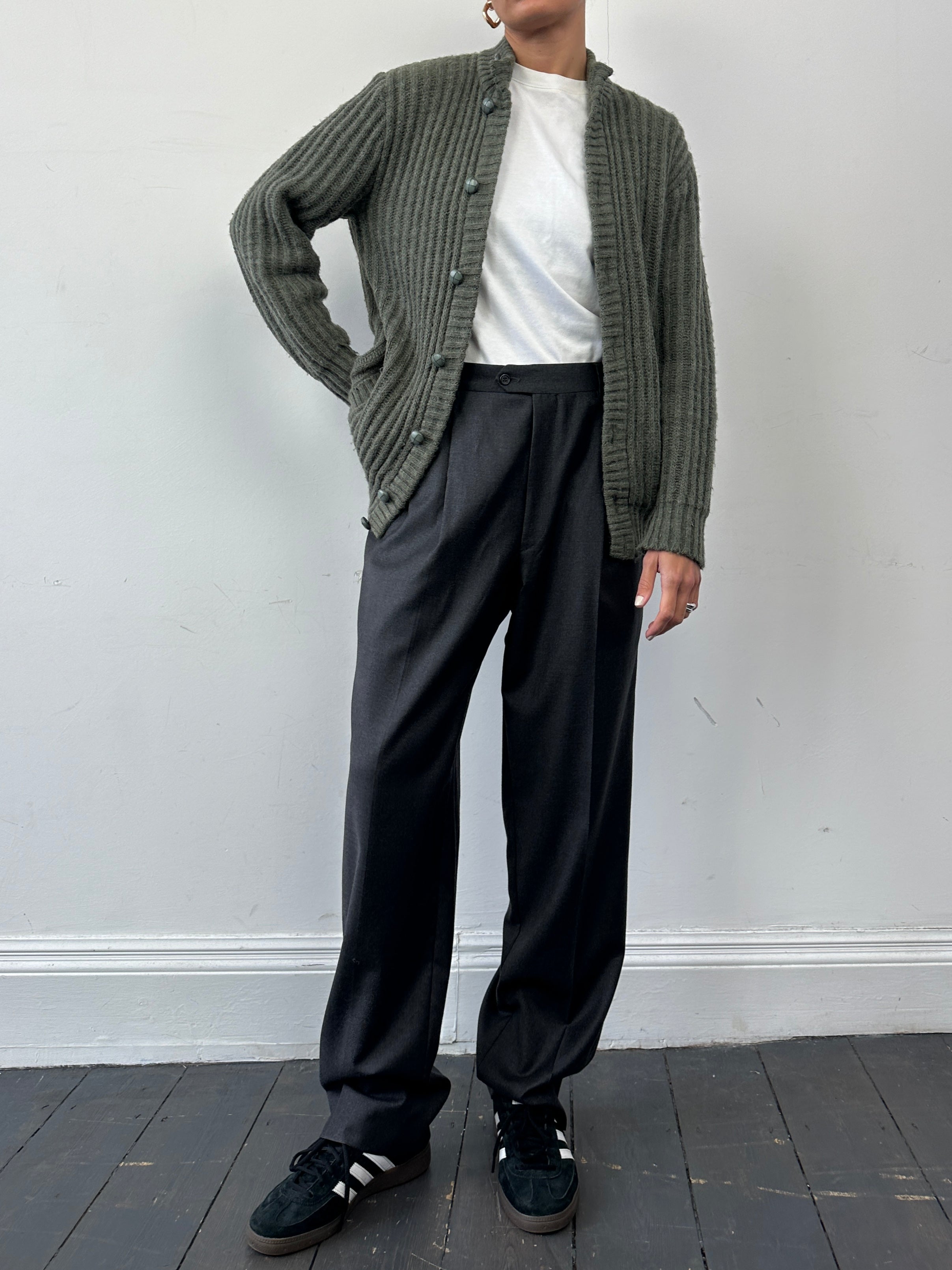 St Michael wool knitted cardigan in size M, featuring a cozy design with button closure and ribbed cuffs, displayed on a model.