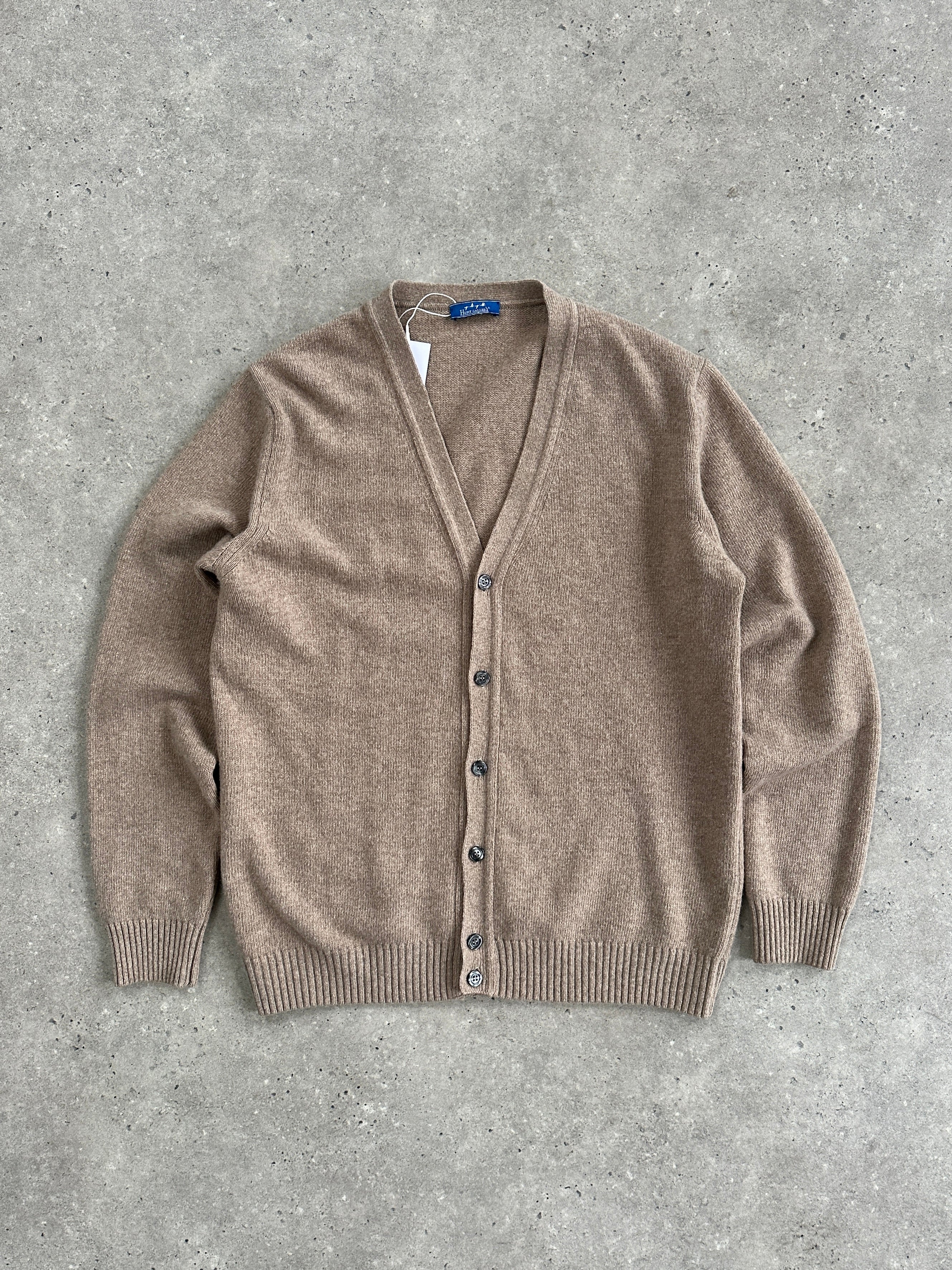 Vintage Italian 1990s virgin wool knitted cardigan in size large, featuring classic knit pattern and cozy fit.