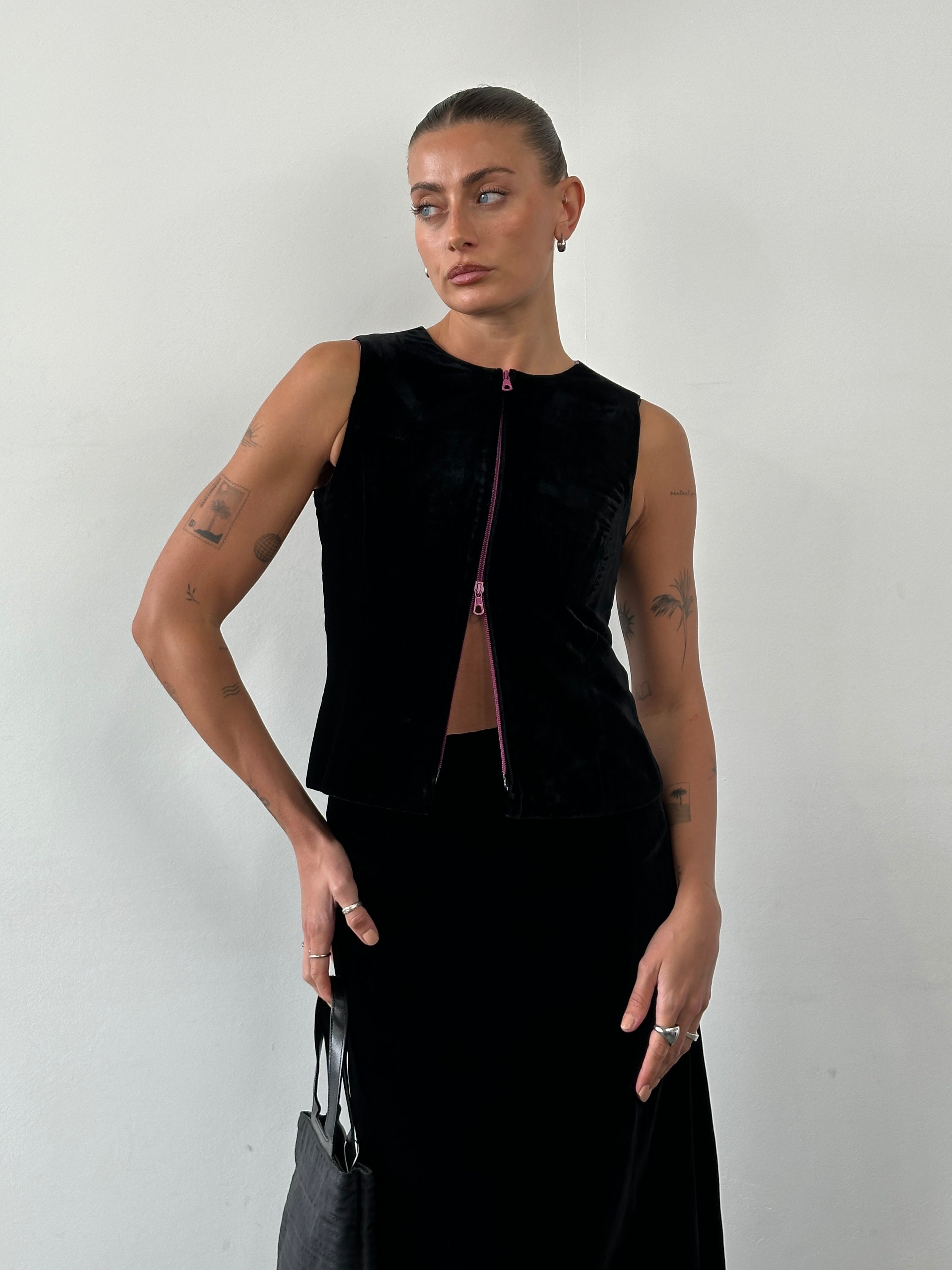 Giorgio Armani Le Collezioni 1980s velvet two-piece skirt set, featuring a matching top and skirt in rich velvet fabric.