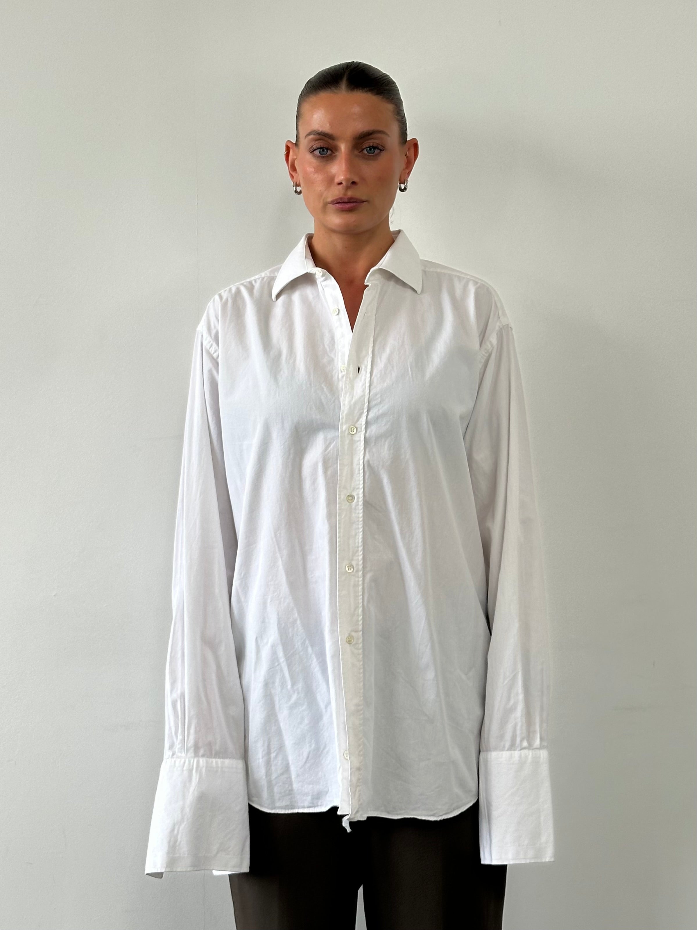 Christian Dior cotton dress shirt in size L/XL, featuring a classic design with crisp white fabric and button-front detail.