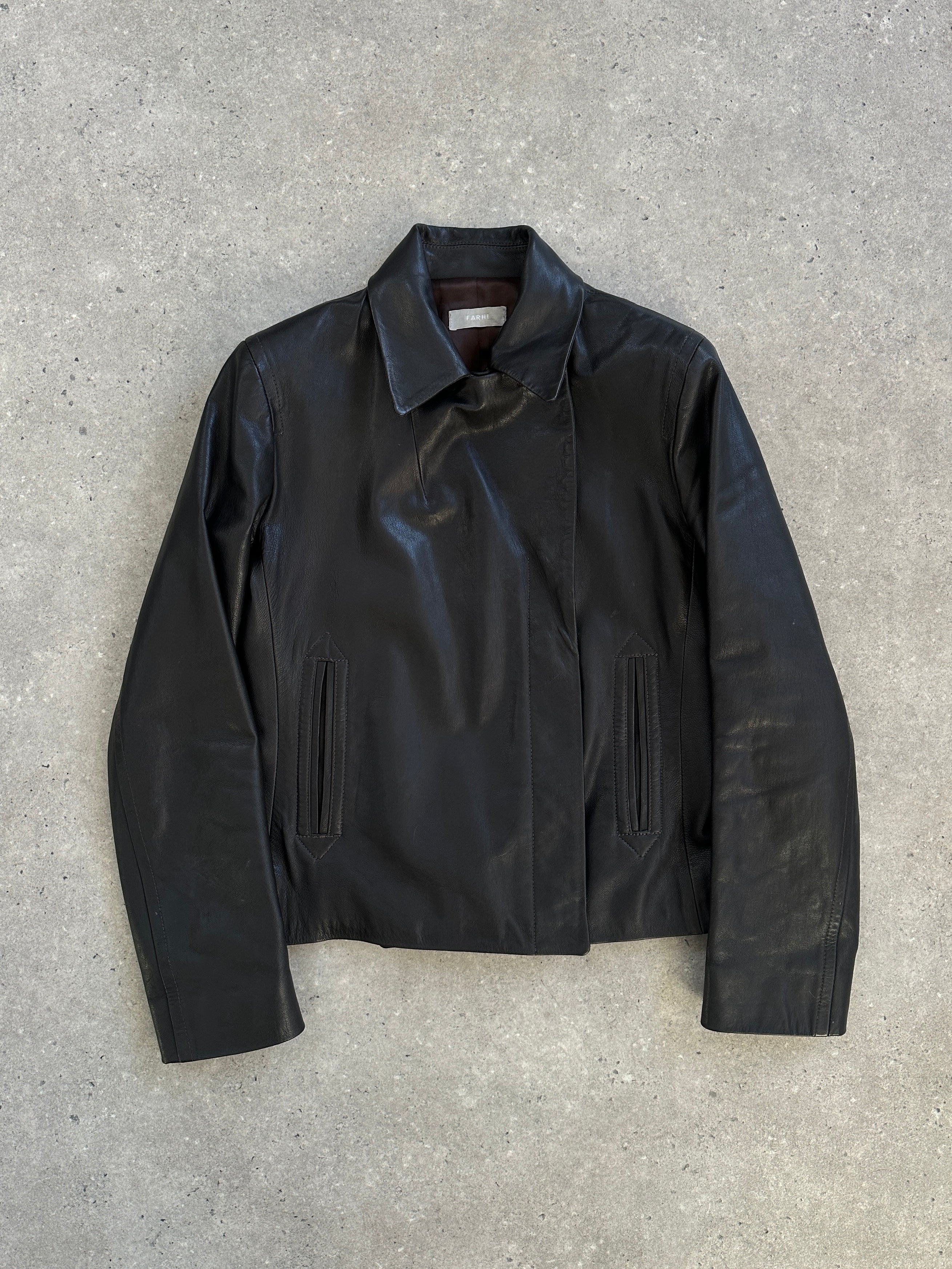 Nicole Farhi 1990s leather jacket in size small, stylish black leather outerwear with classic design details.