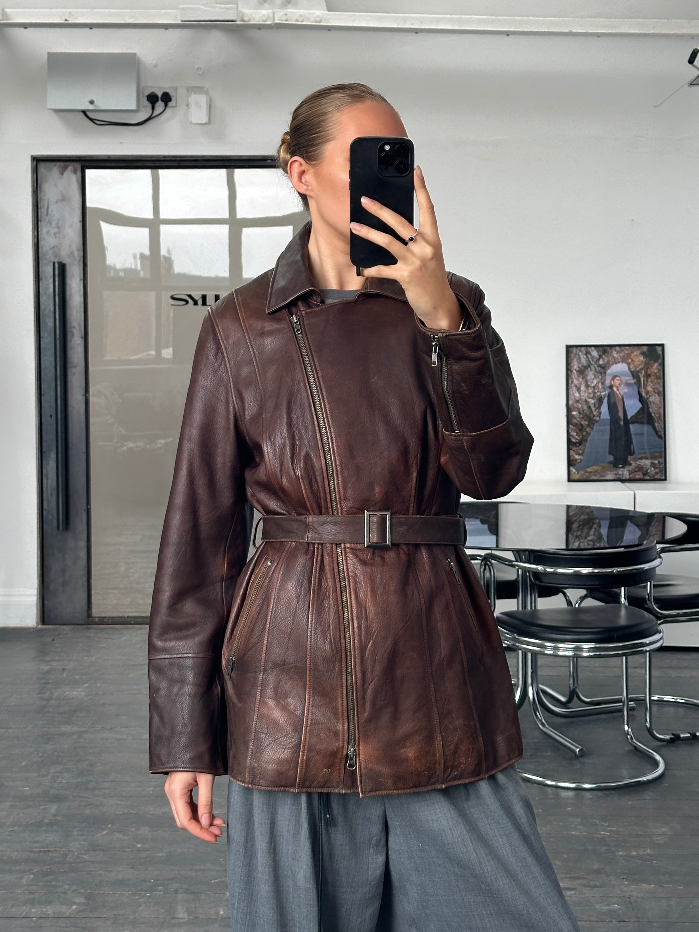 Vintage 1990s aged double zip belted leather jacket, size large, with distressed leather and classic style.