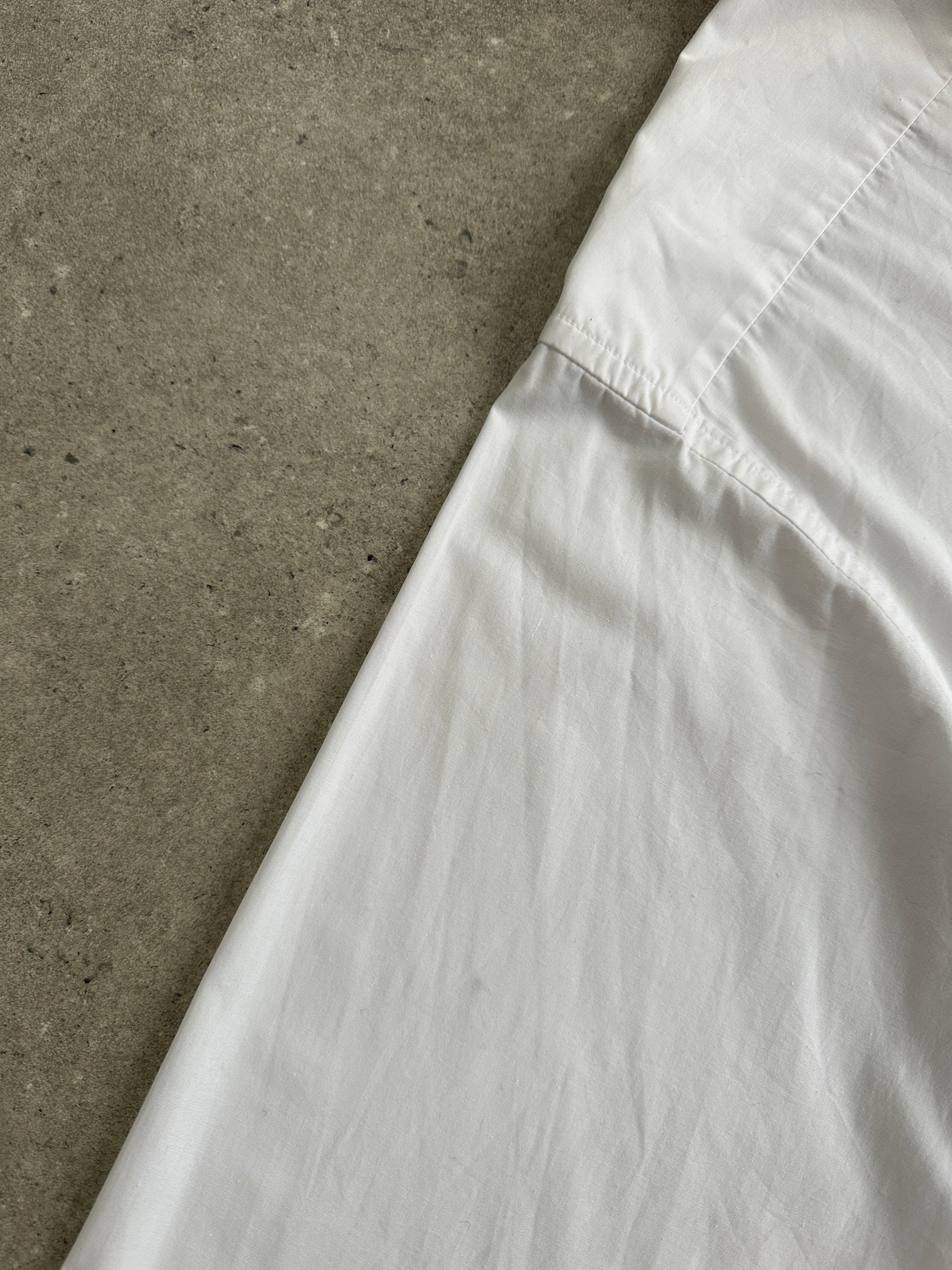 Christian Dior Monsieur 1990s cotton shirt in XL, light-colored fabric with classic collar and button-down front.