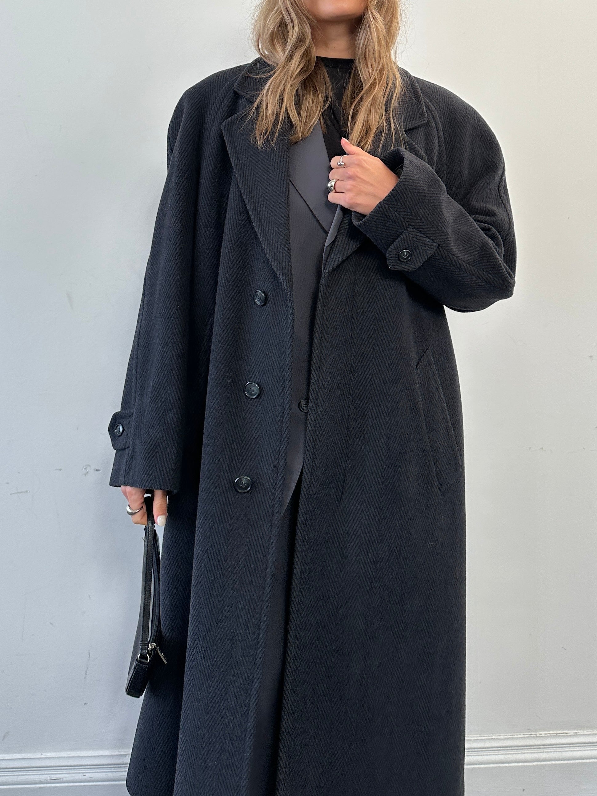 Vintage British wool cashmere herringbone coat with concealed placket in XL size, showcasing classic tailored design and textured fabric.
