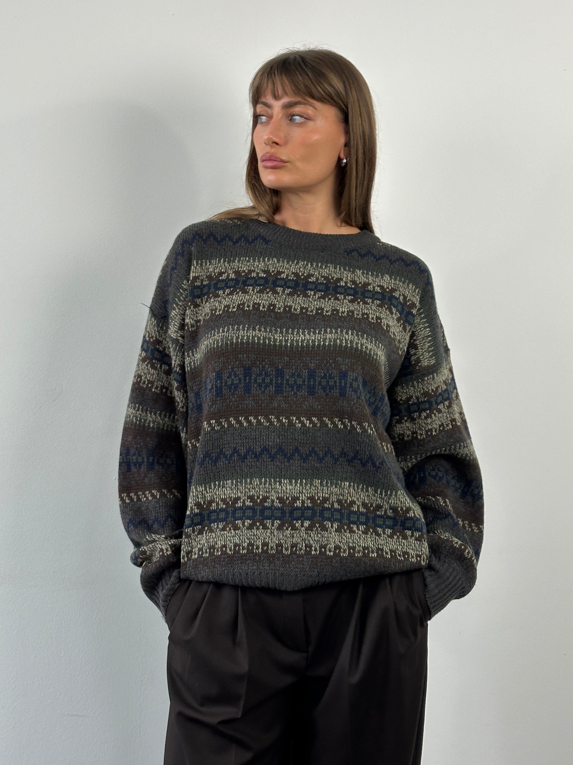 Vintage 1990s Fair Isle knitted jumper in XL, showcasing colorful traditional patterns and cozy wool fabric.