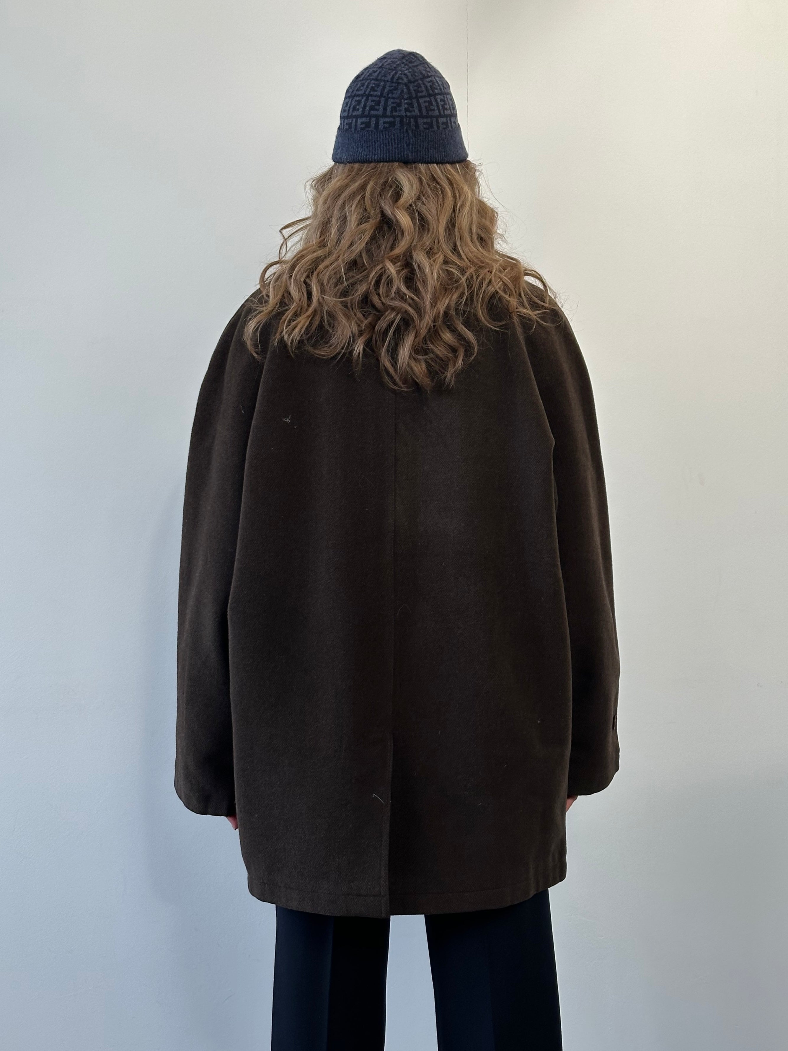 Valentino 80s-90s wool coat with concealed placket, XL size, showing classic tailored design in dark fabric.